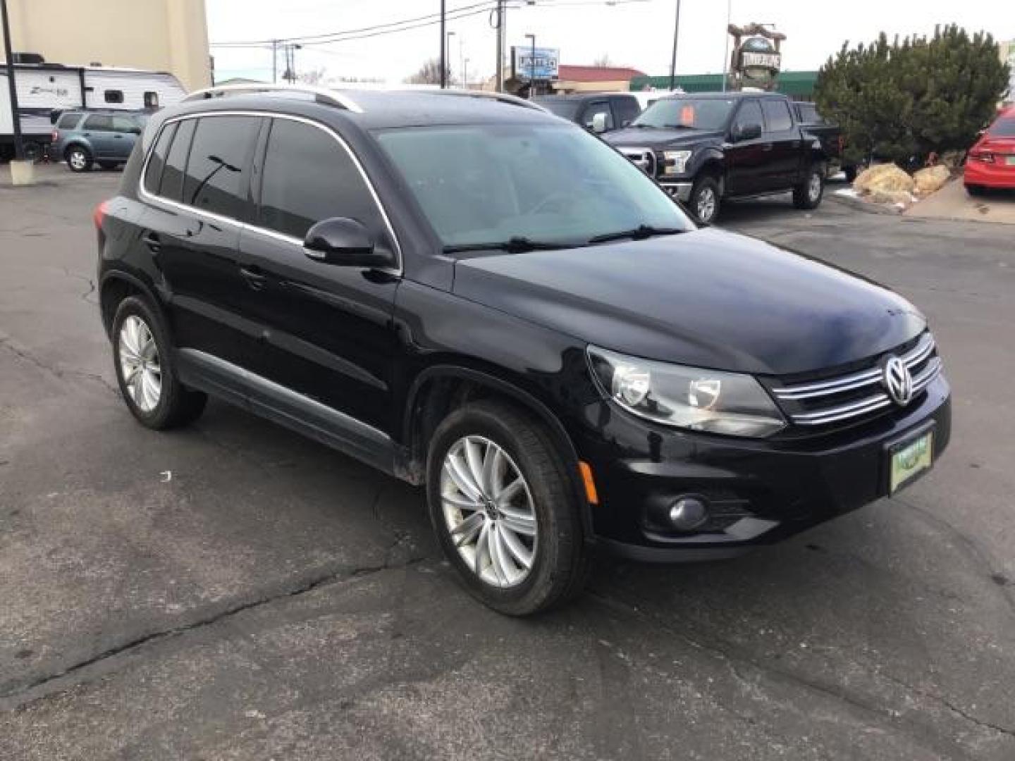 2013 Deep Black Metallic /Black Volkswagen Tiguan 2.0T S 4Motion (WVGBV7AX5DW) with an 2.0L L4 DOHC 16V TURBO engine, 6-Speed Automatic transmission, located at 1235 N Woodruff Ave., Idaho Falls, 83401, (208) 523-1053, 43.507172, -112.000488 - This 2013 Volkswagen Tiguan, has the 2.0T motor. It only has 95,000 miles. It comes with leather interior, heated seats, blue tooth audio, touch screen stereo, and cruise control. At Timberline Auto it is always easy to find a great deal on your next vehicle! Our experienced sales staff can help fin - Photo#5