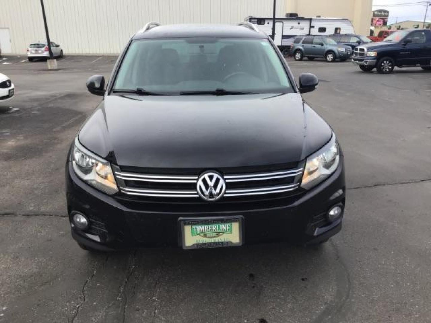 2013 Deep Black Metallic /Black Volkswagen Tiguan 2.0T S 4Motion (WVGBV7AX5DW) with an 2.0L L4 DOHC 16V TURBO engine, 6-Speed Automatic transmission, located at 1235 N Woodruff Ave., Idaho Falls, 83401, (208) 523-1053, 43.507172, -112.000488 - This 2013 Volkswagen Tiguan, has the 2.0T motor. It only has 95,000 miles. It comes with leather interior, heated seats, blue tooth audio, touch screen stereo, and cruise control. At Timberline Auto it is always easy to find a great deal on your next vehicle! Our experienced sales staff can help fin - Photo#6