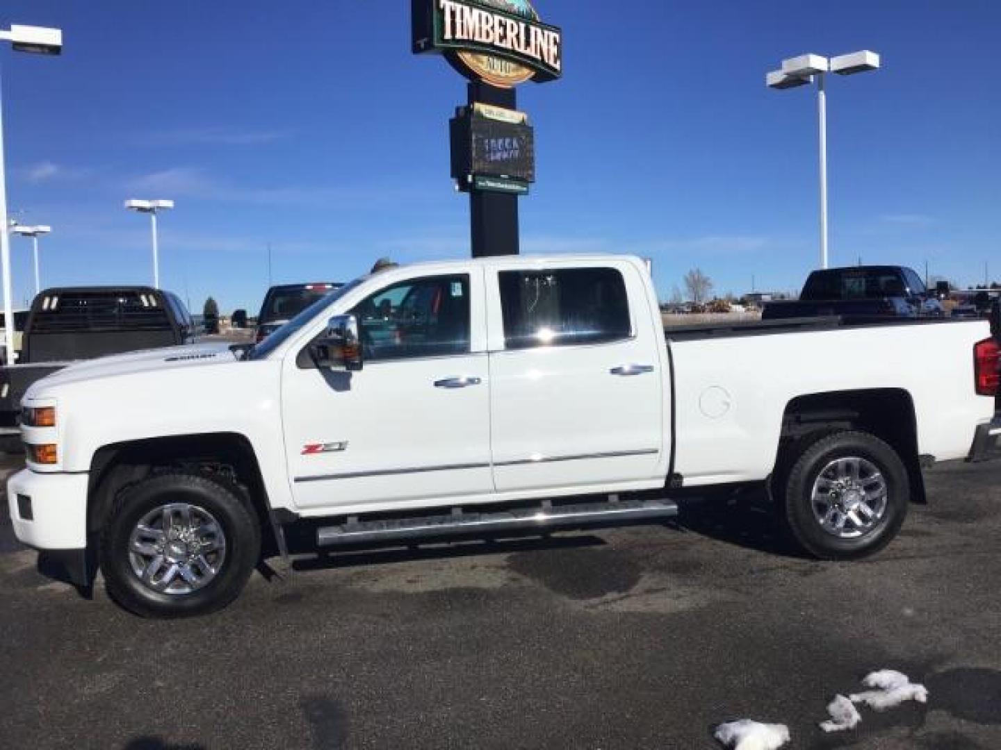 2017 Summit White /Jet Black, leather Chevrolet Silverado 3500HD LTZ Crew Cab 4WD (1GC4K0CY2HF) with an 6.6L V8 OHV 32V TURBO DIESEL engine, 6-Speed Automatic transmission, located at 1235 N Woodruff Ave., Idaho Falls, 83401, (208) 523-1053, 43.507172, -112.000488 - This 2017 Chevrolet 3500HD 4x4 Z71 LTZ, has the 6.6L diesel motor. It has 42,847 miles. It has leather interior, heated seats, sunroof, spray in bedliner, back up camera, also comes with a turnover ball. At Timberline Auto it is always easy to find a great deal on your next vehicle! Our experienced - Photo#1