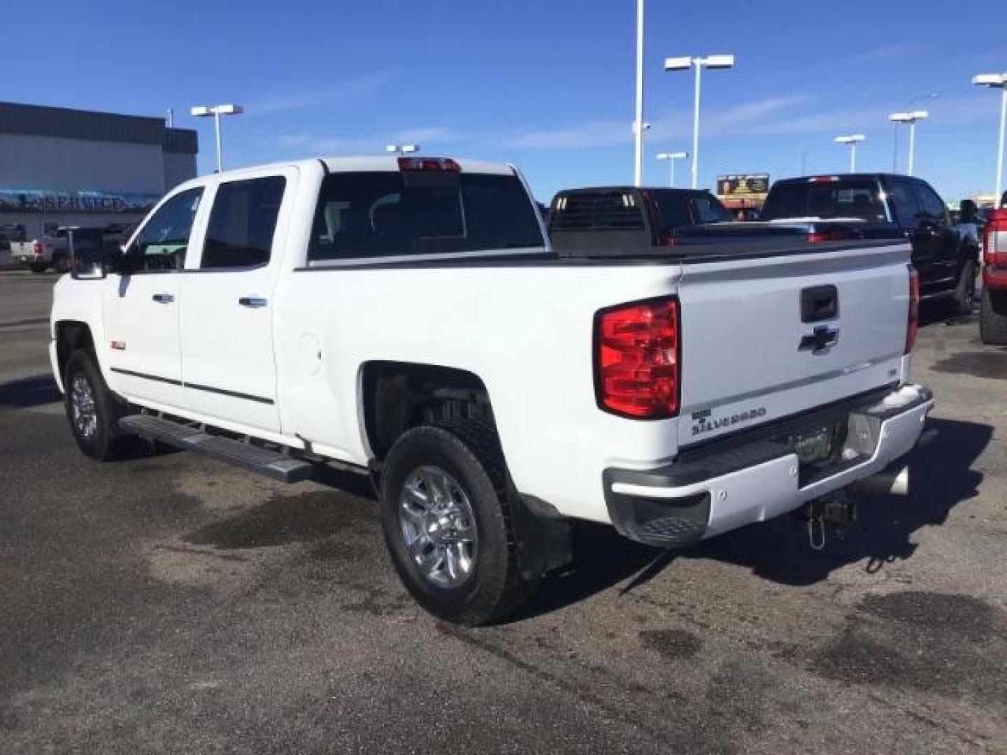 2017 Summit White /Jet Black, leather Chevrolet Silverado 3500HD LTZ Crew Cab 4WD (1GC4K0CY2HF) with an 6.6L V8 OHV 32V TURBO DIESEL engine, 6-Speed Automatic transmission, located at 1235 N Woodruff Ave., Idaho Falls, 83401, (208) 523-1053, 43.507172, -112.000488 - This 2017 Chevrolet 3500HD 4x4 Z71 LTZ, has the 6.6L diesel motor. It has 42,847 miles. It has leather interior, heated seats, sunroof, spray in bedliner, back up camera, also comes with a turnover ball. At Timberline Auto it is always easy to find a great deal on your next vehicle! Our experienced - Photo#2