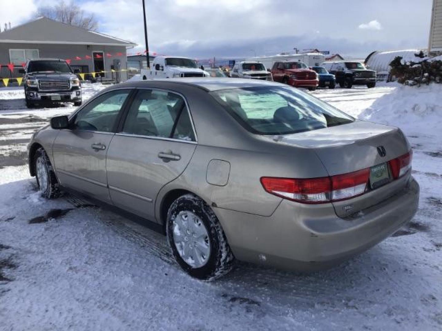 2003 Honda Accord LX sedan AT (JHMCM56353C) with an 2.4L L4 DOHC 16V engine, 5-Speed Automatic transmission, located at 1235 N Woodruff Ave., Idaho Falls, 83401, (208) 523-1053, 43.507172, -112.000488 - This 2003 Honda Accord LX, has 166,000 miles. It comes with cloth interior, cruise control, AM/FM CD player, power windows, and power locks. At Timberline Auto it is always easy to find a great deal on your next vehicle! Our experienced sales staff can help find the right vehicle will fit your needs - Photo#2