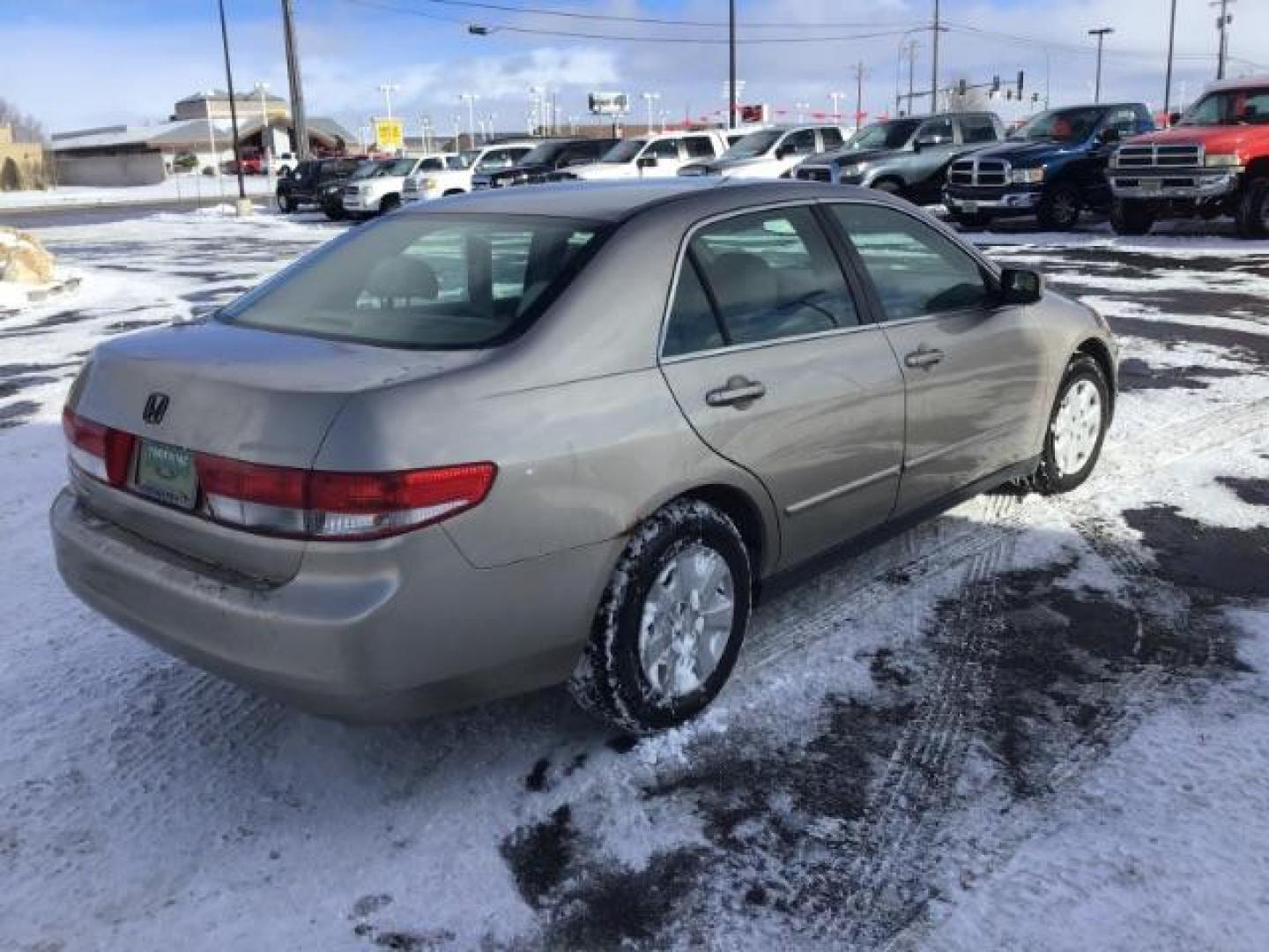 2003 Honda Accord LX sedan AT (JHMCM56353C) with an 2.4L L4 DOHC 16V engine, 5-Speed Automatic transmission, located at 1235 N Woodruff Ave., Idaho Falls, 83401, (208) 523-1053, 43.507172, -112.000488 - This 2003 Honda Accord LX, has 166,000 miles. It comes with cloth interior, cruise control, AM/FM CD player, power windows, and power locks. At Timberline Auto it is always easy to find a great deal on your next vehicle! Our experienced sales staff can help find the right vehicle will fit your needs - Photo#4