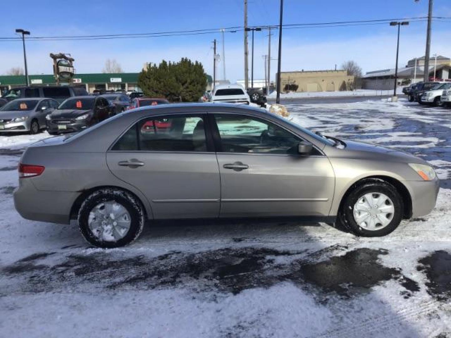 2003 Honda Accord LX sedan AT (JHMCM56353C) with an 2.4L L4 DOHC 16V engine, 5-Speed Automatic transmission, located at 1235 N Woodruff Ave., Idaho Falls, 83401, (208) 523-1053, 43.507172, -112.000488 - This 2003 Honda Accord LX, has 166,000 miles. It comes with cloth interior, cruise control, AM/FM CD player, power windows, and power locks. At Timberline Auto it is always easy to find a great deal on your next vehicle! Our experienced sales staff can help find the right vehicle will fit your needs - Photo#5