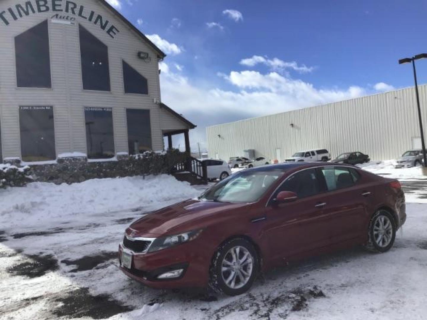 2012 Dark Cherry Pearl Metallic /Gray Leather Interior Kia Optima EX (5XXGN4A73CG) with an 2.4L L4 DOHC 16V engine, 6-Speed Automatic transmission, located at 1235 N Woodruff Ave., Idaho Falls, 83401, (208) 523-1053, 43.507172, -112.000488 - This 2012 Kia Optima Ex, has 121,000 miles. Comes with Leather interior, heated seats, back up camera, blue tooth audio, and power seats. At Timberline Auto it is always easy to find a great deal on your next vehicle! Our experienced sales staff can help find the right vehicle will fit your needs. O - Photo#0