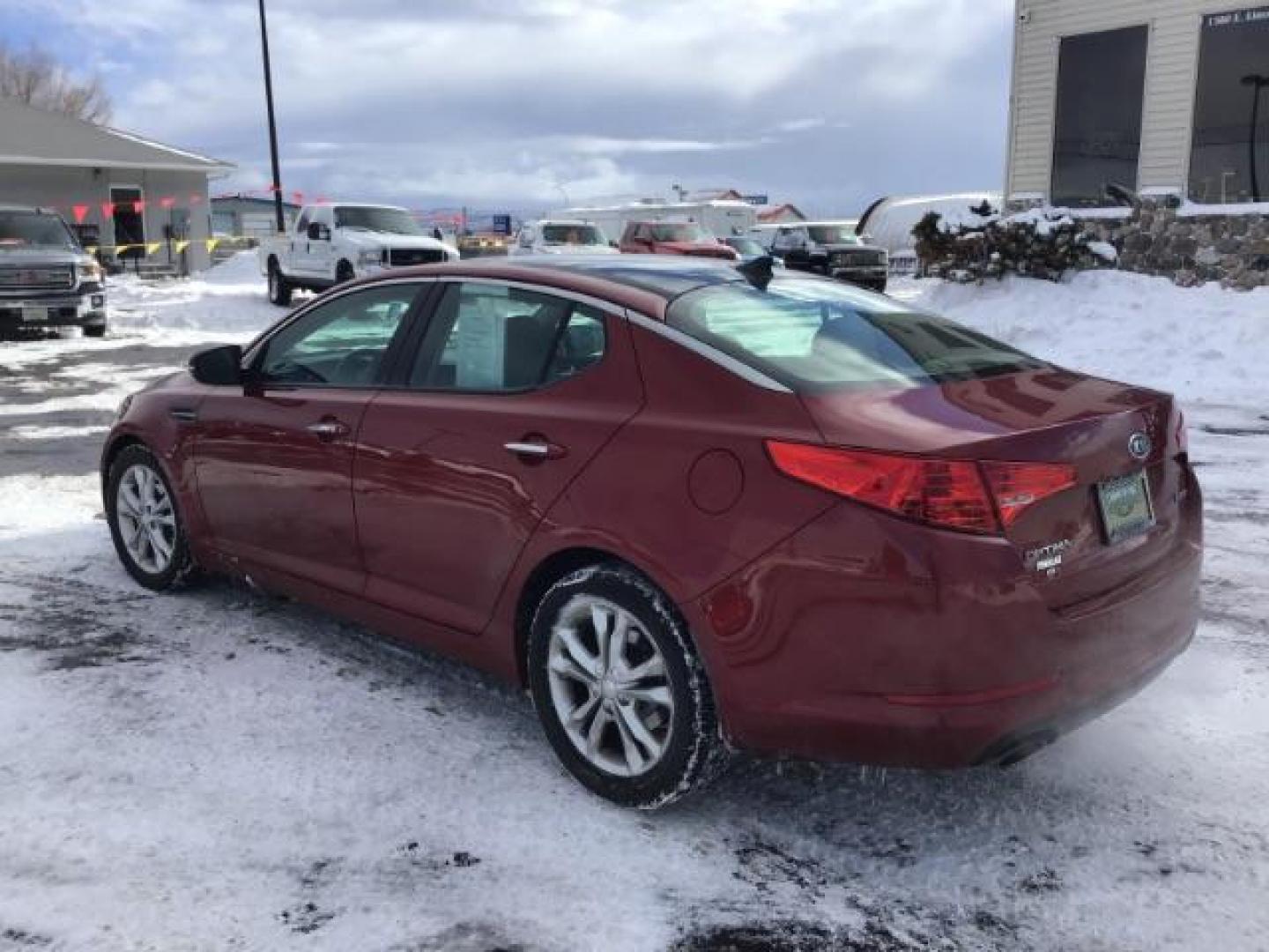 2012 Dark Cherry Pearl Metallic /Gray Leather Interior Kia Optima EX (5XXGN4A73CG) with an 2.4L L4 DOHC 16V engine, 6-Speed Automatic transmission, located at 1235 N Woodruff Ave., Idaho Falls, 83401, (208) 523-1053, 43.507172, -112.000488 - This 2012 Kia Optima Ex, has 121,000 miles. Comes with Leather interior, heated seats, back up camera, blue tooth audio, and power seats. At Timberline Auto it is always easy to find a great deal on your next vehicle! Our experienced sales staff can help find the right vehicle will fit your needs. O - Photo#2