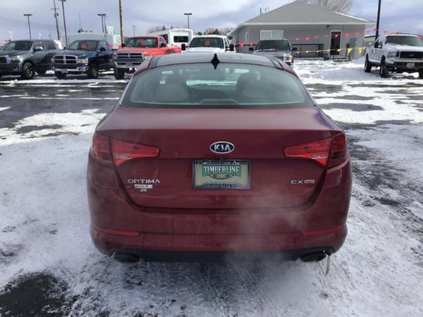 2012 Dark Cherry Pearl Metallic /Gray Leather Interior Kia Optima EX (5XXGN4A73CG) with an 2.4L L4 DOHC 16V engine, 6-Speed Automatic transmission, located at 1235 N Woodruff Ave., Idaho Falls, 83401, (208) 523-1053, 43.507172, -112.000488 - This 2012 Kia Optima Ex, has 121,000 miles. Comes with Leather interior, heated seats, back up camera, blue tooth audio, and power seats. At Timberline Auto it is always easy to find a great deal on your next vehicle! Our experienced sales staff can help find the right vehicle will fit your needs. O - Photo#3