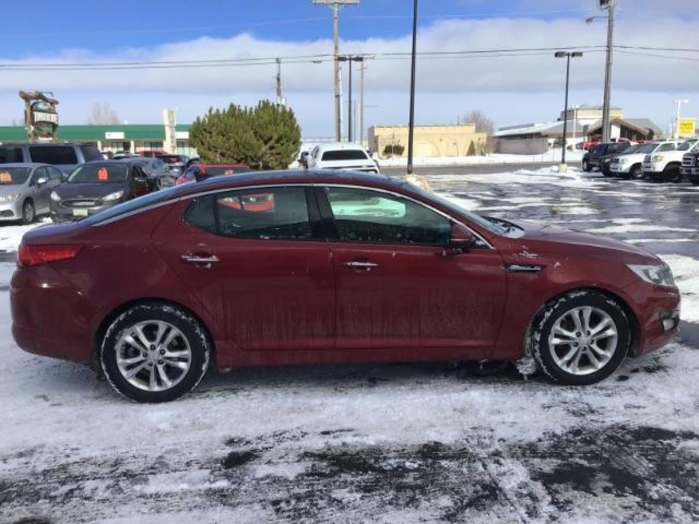 2012 Dark Cherry Pearl Metallic /Gray Leather Interior Kia Optima EX (5XXGN4A73CG) with an 2.4L L4 DOHC 16V engine, 6-Speed Automatic transmission, located at 1235 N Woodruff Ave., Idaho Falls, 83401, (208) 523-1053, 43.507172, -112.000488 - This 2012 Kia Optima Ex, has 121,000 miles. Comes with Leather interior, heated seats, back up camera, blue tooth audio, and power seats. At Timberline Auto it is always easy to find a great deal on your next vehicle! Our experienced sales staff can help find the right vehicle will fit your needs. O - Photo#5