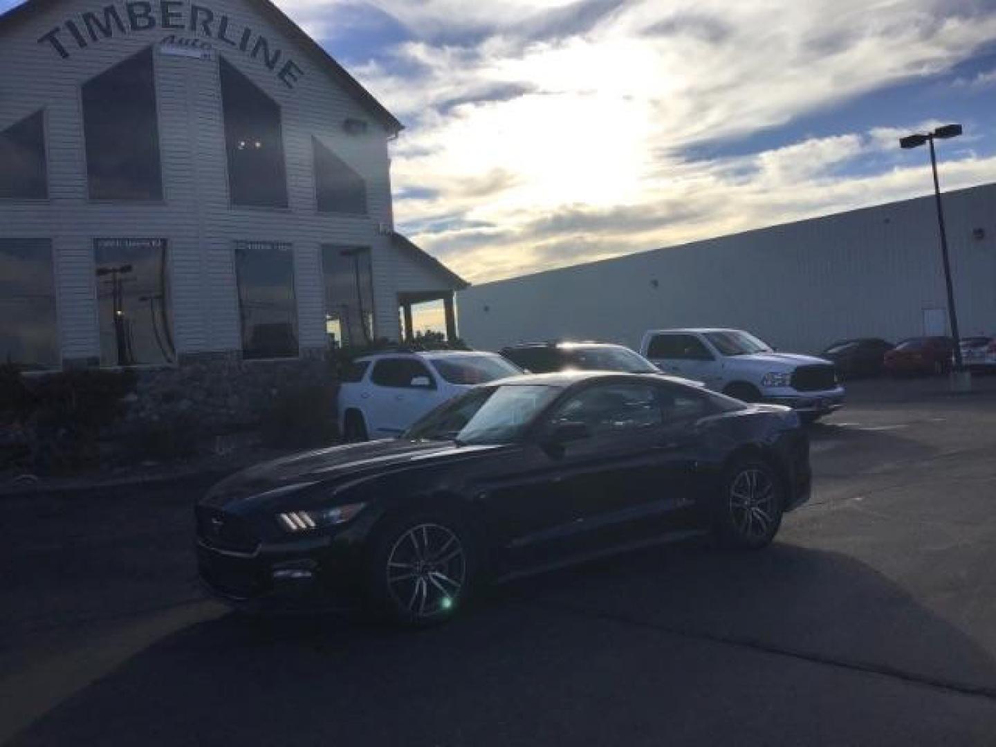 2015 Black /Ebony Ford Mustang EcoBoost Coupe (1FA6P8TH7F5) with an 2.3L L4 DOHC 16V engine, 6-Speed Manual transmission, located at 1235 N Woodruff Ave., Idaho Falls, 83401, (208) 523-1053, 43.507172, -112.000488 - This 2015 Ford Mustang, has the 3.5L V6 eco boost motor. It has a manual transmission. It comes with leather interior, back up camera, keyless remote, power locks, power windows, and driver power seat. At Timberline Auto it is always easy to find a great deal on your next vehicle! Our experienced sa - Photo#0