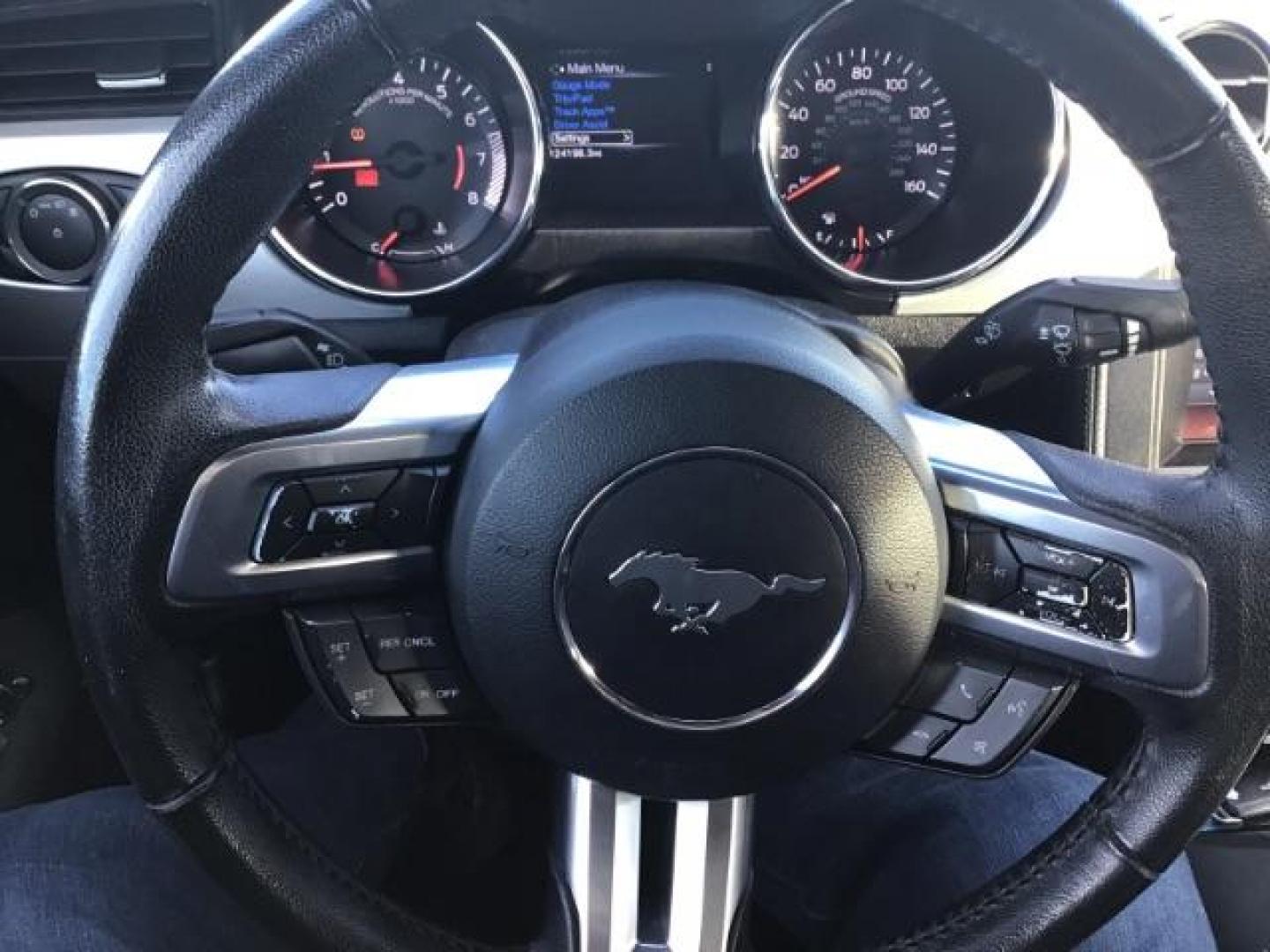 2015 Black /Ebony Ford Mustang EcoBoost Coupe (1FA6P8TH7F5) with an 2.3L L4 DOHC 16V engine, 6-Speed Manual transmission, located at 1235 N Woodruff Ave., Idaho Falls, 83401, (208) 523-1053, 43.507172, -112.000488 - This 2015 Ford Mustang, has the 3.5L V6 eco boost motor. It has a manual transmission. It comes with leather interior, back up camera, keyless remote, power locks, power windows, and driver power seat. At Timberline Auto it is always easy to find a great deal on your next vehicle! Our experienced sa - Photo#14