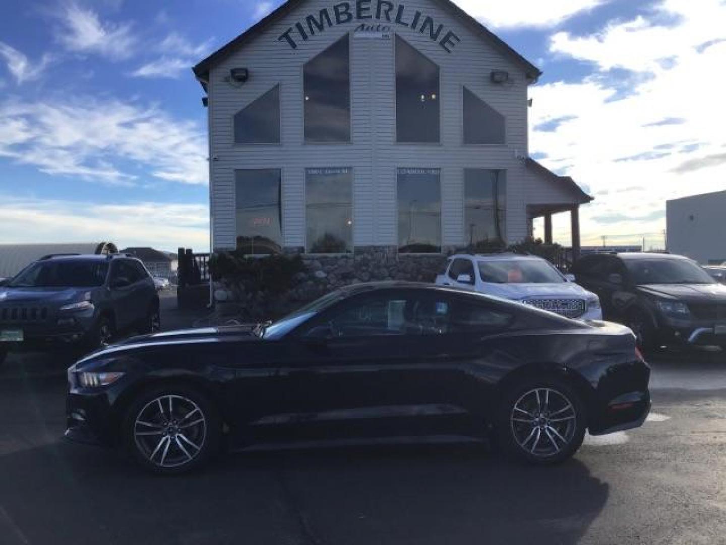 2015 Black /Ebony Ford Mustang EcoBoost Coupe (1FA6P8TH7F5) with an 2.3L L4 DOHC 16V engine, 6-Speed Manual transmission, located at 1235 N Woodruff Ave., Idaho Falls, 83401, (208) 523-1053, 43.507172, -112.000488 - This 2015 Ford Mustang, has the 3.5L V6 eco boost motor. It has a manual transmission. It comes with leather interior, back up camera, keyless remote, power locks, power windows, and driver power seat. At Timberline Auto it is always easy to find a great deal on your next vehicle! Our experienced sa - Photo#1