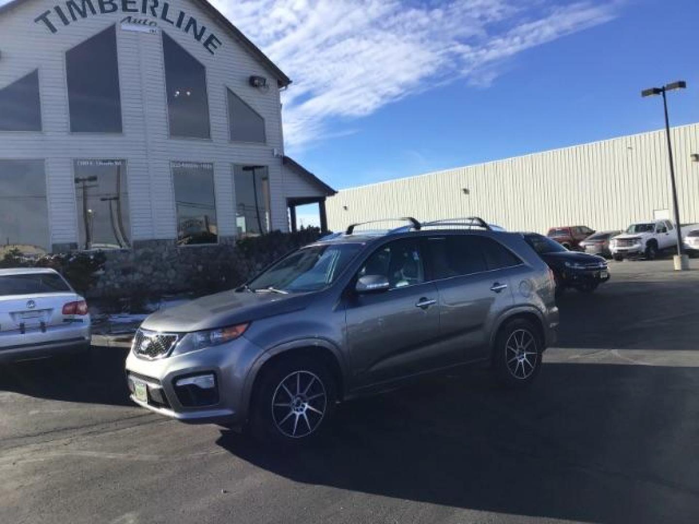 2013 Titanium Silver Kia Sorento SX 4WD (5XYKWDA25DG) with an 3.5L V6 DOHC 24V engine, 6-Speed Automatic transmission, located at 1235 N Woodruff Ave., Idaho Falls, 83401, (208) 523-1053, 43.507172, -112.000488 - This 2013 Kia Sorento SX, has the V6 motor. It has 169,000 miles. It comes with leather interior, heated and cooled seats. power seats, dual sunroofs, blue tooth, and navigation. At Timberline Auto it is always easy to find a great deal on your next vehicle! Our experienced sales staff can help find - Photo#0