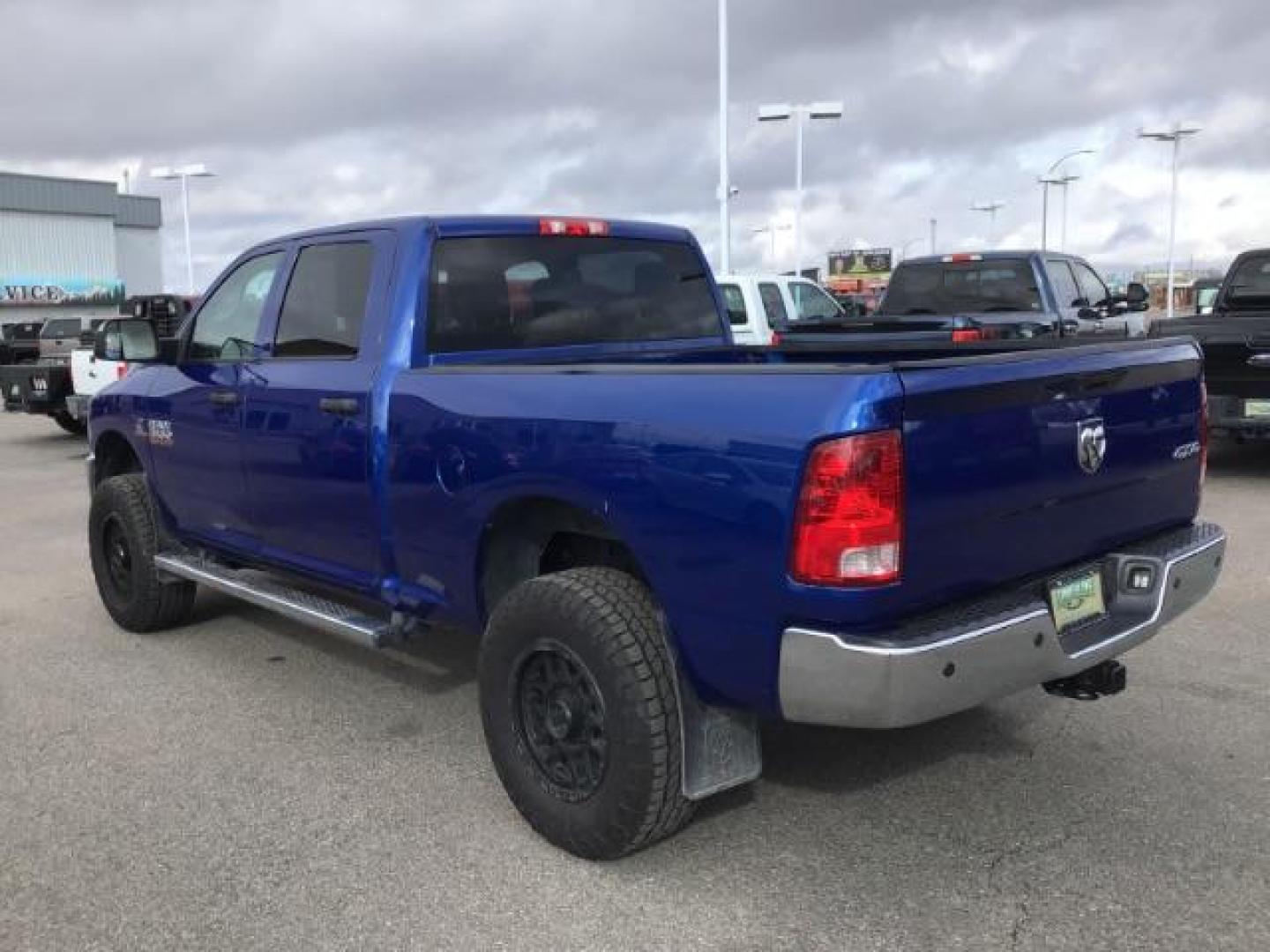 2014 BLUE /Diesel Gray/Black RAM 3500 ST Crew Cab SWB 4WD (3C63R3CL3EG) with an 6.7L L6 OHV 24V TURBO DIESEL engine, 6-Speed Automatic transmission, located at 1235 N Woodruff Ave., Idaho Falls, 83401, (208) 523-1053, 43.507172, -112.000488 - This 2014 Ram 3500 Tradesman 4x4, has the 6.7L diesel motor. It only has 73,000 miles. Comes with Cloth interior, keyless remote, cruise control, power windows and locks, and fixed running boards. At Timberline Auto it is always easy to find a great deal on your next vehicle! Our experienced sales s - Photo#2