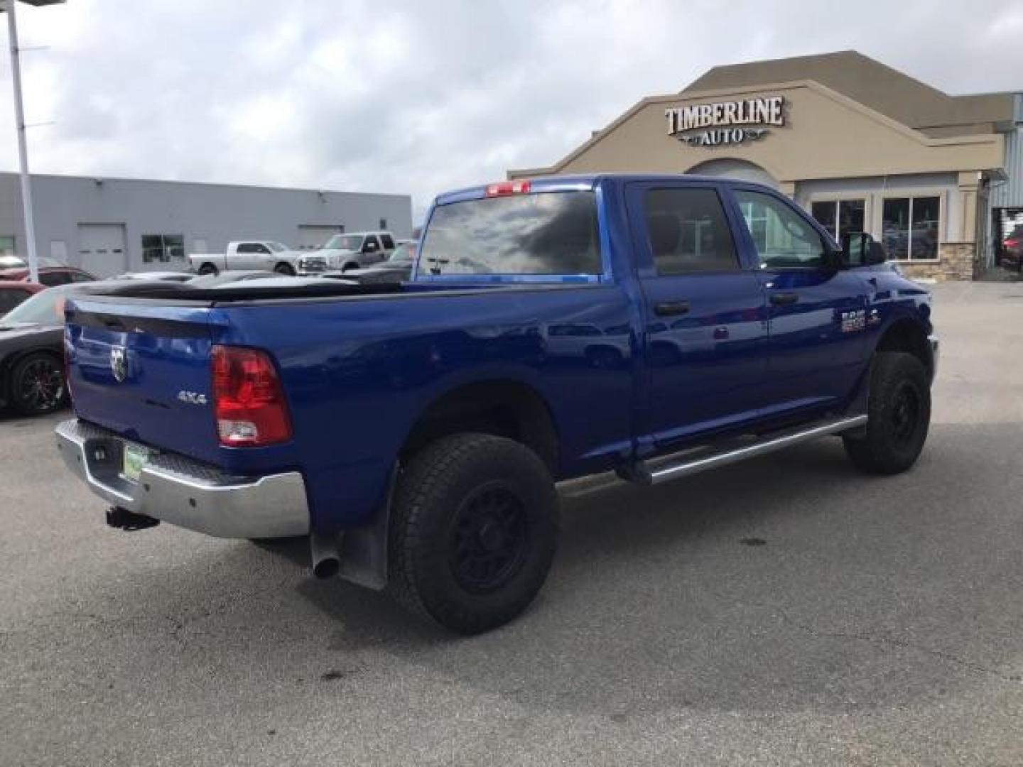 2014 BLUE /Diesel Gray/Black RAM 3500 ST Crew Cab SWB 4WD (3C63R3CL3EG) with an 6.7L L6 OHV 24V TURBO DIESEL engine, 6-Speed Automatic transmission, located at 1235 N Woodruff Ave., Idaho Falls, 83401, (208) 523-1053, 43.507172, -112.000488 - This 2014 Ram 3500 Tradesman 4x4, has the 6.7L diesel motor. It only has 73,000 miles. Comes with Cloth interior, keyless remote, cruise control, power windows and locks, and fixed running boards. At Timberline Auto it is always easy to find a great deal on your next vehicle! Our experienced sales s - Photo#4