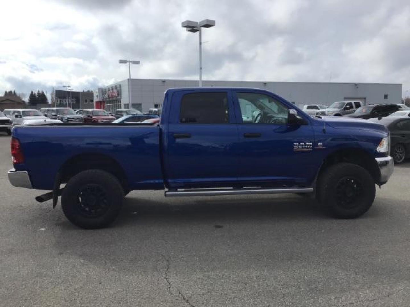 2014 BLUE /Diesel Gray/Black RAM 3500 ST Crew Cab SWB 4WD (3C63R3CL3EG) with an 6.7L L6 OHV 24V TURBO DIESEL engine, 6-Speed Automatic transmission, located at 1235 N Woodruff Ave., Idaho Falls, 83401, (208) 523-1053, 43.507172, -112.000488 - This 2014 Ram 3500 Tradesman 4x4, has the 6.7L diesel motor. It only has 73,000 miles. Comes with Cloth interior, keyless remote, cruise control, power windows and locks, and fixed running boards. At Timberline Auto it is always easy to find a great deal on your next vehicle! Our experienced sales s - Photo#5