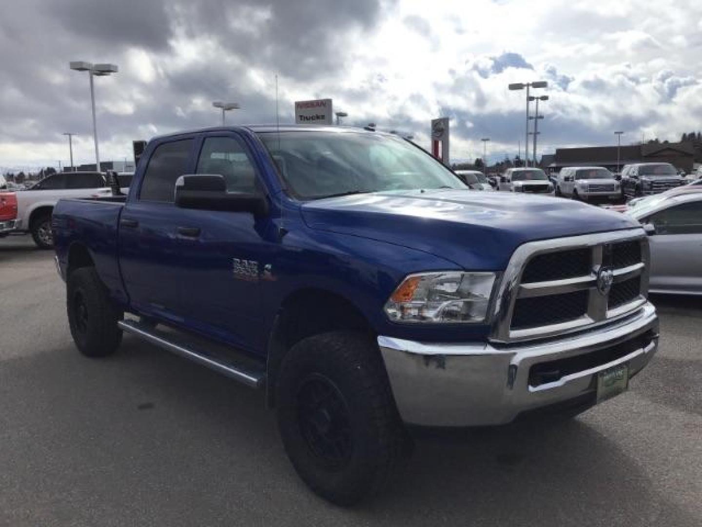 2014 BLUE /Diesel Gray/Black RAM 3500 ST Crew Cab SWB 4WD (3C63R3CL3EG) with an 6.7L L6 OHV 24V TURBO DIESEL engine, 6-Speed Automatic transmission, located at 1235 N Woodruff Ave., Idaho Falls, 83401, (208) 523-1053, 43.507172, -112.000488 - This 2014 Ram 3500 Tradesman 4x4, has the 6.7L diesel motor. It only has 73,000 miles. Comes with Cloth interior, keyless remote, cruise control, power windows and locks, and fixed running boards. At Timberline Auto it is always easy to find a great deal on your next vehicle! Our experienced sales s - Photo#6