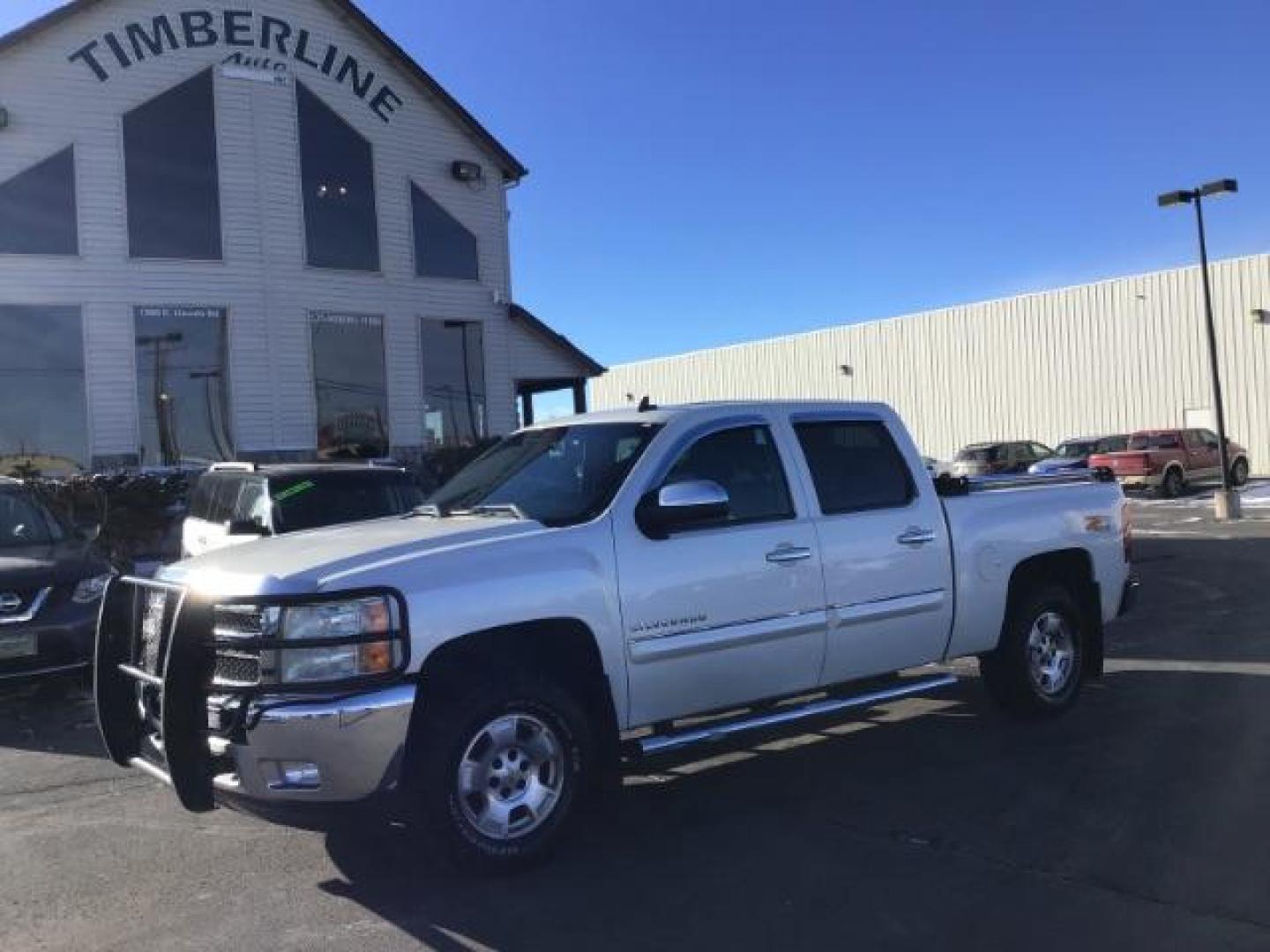 2012 White Diamond /Ebony Cloth Interior Chevrolet Silverado 1500 LT Crew Cab 4WD (3GCPKSE70CG) with an 5.3L V8 OHV 16V FFV engine, 6-Speed Automatic transmission, located at 1235 N Woodruff Ave., Idaho Falls, 83401, (208) 523-1053, 43.507172, -112.000488 - This 2012 Chevrolet 1500 LT, has the 5.3L V8 motor. It has 216,000 miles. It is 4x4, Comes with Power seats, cruise control, AM / FM CD stereo. At Timberline Auto it is always easy to find a great deal on your next vehicle! Our experienced sales staff can help find the right vehicle will fit your ne - Photo#0