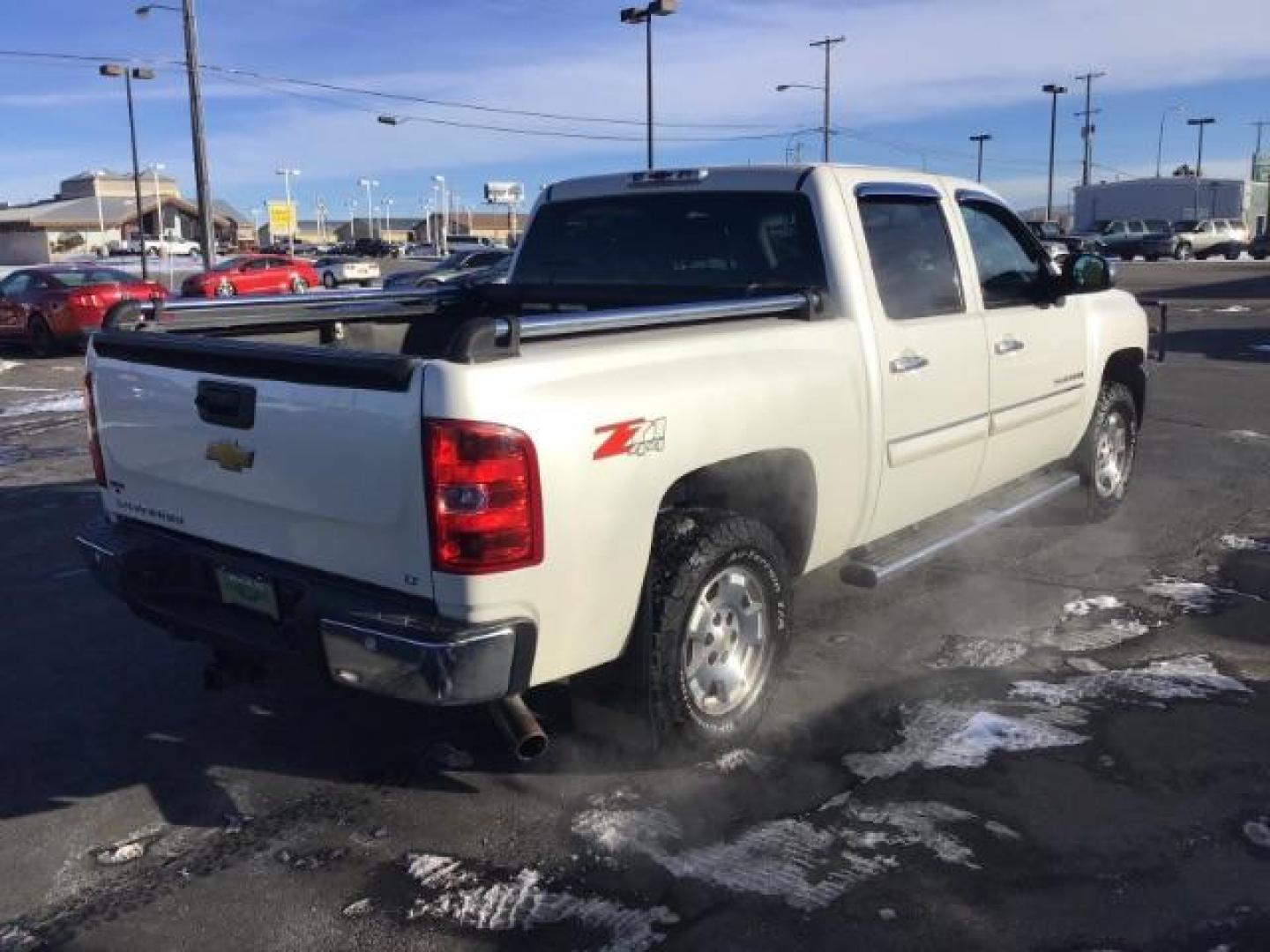 2012 White Diamond /Ebony Cloth Interior Chevrolet Silverado 1500 LT Crew Cab 4WD (3GCPKSE70CG) with an 5.3L V8 OHV 16V FFV engine, 6-Speed Automatic transmission, located at 1235 N Woodruff Ave., Idaho Falls, 83401, (208) 523-1053, 43.507172, -112.000488 - This 2012 Chevrolet 1500 LT, has the 5.3L V8 motor. It has 216,000 miles. It is 4x4, Comes with Power seats, cruise control, AM / FM CD stereo. At Timberline Auto it is always easy to find a great deal on your next vehicle! Our experienced sales staff can help find the right vehicle will fit your ne - Photo#4