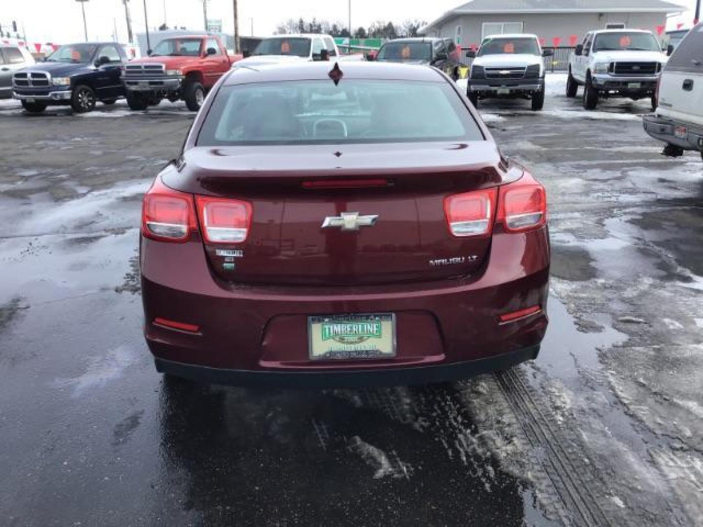 2015 Butte Red Metallic Chevrolet Malibu SEDAN 4-DR (1G11D5SL5FF) with an 2.5L L4 DOHC 16V engine, 6-Speed Automatic transmission, located at 1235 N Woodruff Ave., Idaho Falls, 83401, (208) 523-1053, 43.507172, -112.000488 - This 2015 Chevrolet Malibu 2LT, has 134,000 miles. Comes with Leather interior, heated seats, power seats, blue tooth audio, touch screen stereo, and back up camera. At Timberline Auto it is always easy to find a great deal on your next vehicle! Our experienced sales staff can help find the right v - Photo#3