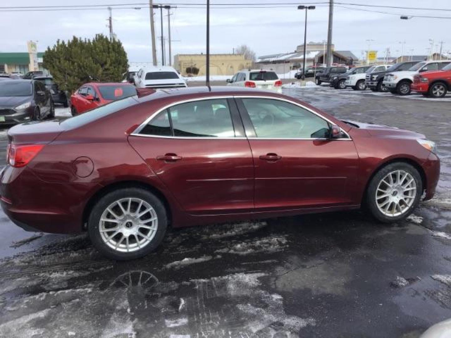 2015 Butte Red Metallic Chevrolet Malibu SEDAN 4-DR (1G11D5SL5FF) with an 2.5L L4 DOHC 16V engine, 6-Speed Automatic transmission, located at 1235 N Woodruff Ave., Idaho Falls, 83401, (208) 523-1053, 43.507172, -112.000488 - This 2015 Chevrolet Malibu 2LT, has 134,000 miles. Comes with Leather interior, heated seats, power seats, blue tooth audio, touch screen stereo, and back up camera. At Timberline Auto it is always easy to find a great deal on your next vehicle! Our experienced sales staff can help find the right v - Photo#5