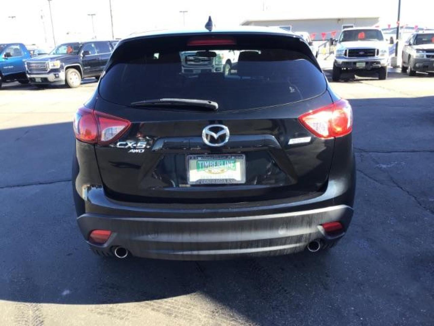 2016 DARK BLUE /Black, premium cloth Mazda CX-5 Touring AWD (JM3KE4CY8G0) with an 2.5L L4 DOHC 16V engine, 6-Speed Automatic transmission, located at 1235 N Woodruff Ave., Idaho Falls, 83401, (208) 523-1053, 43.507172, -112.000488 - This 2016 Mazda CX-5 AWD Touring, has 91,000 miles. Comes with cloth interior, back up camera, blue tooth audio, steering wheel controls, power seats, and power locks and windows. At Timberline Auto it is always easy to find a great deal on your next vehicle! Our experienced sales staff can help fin - Photo#3