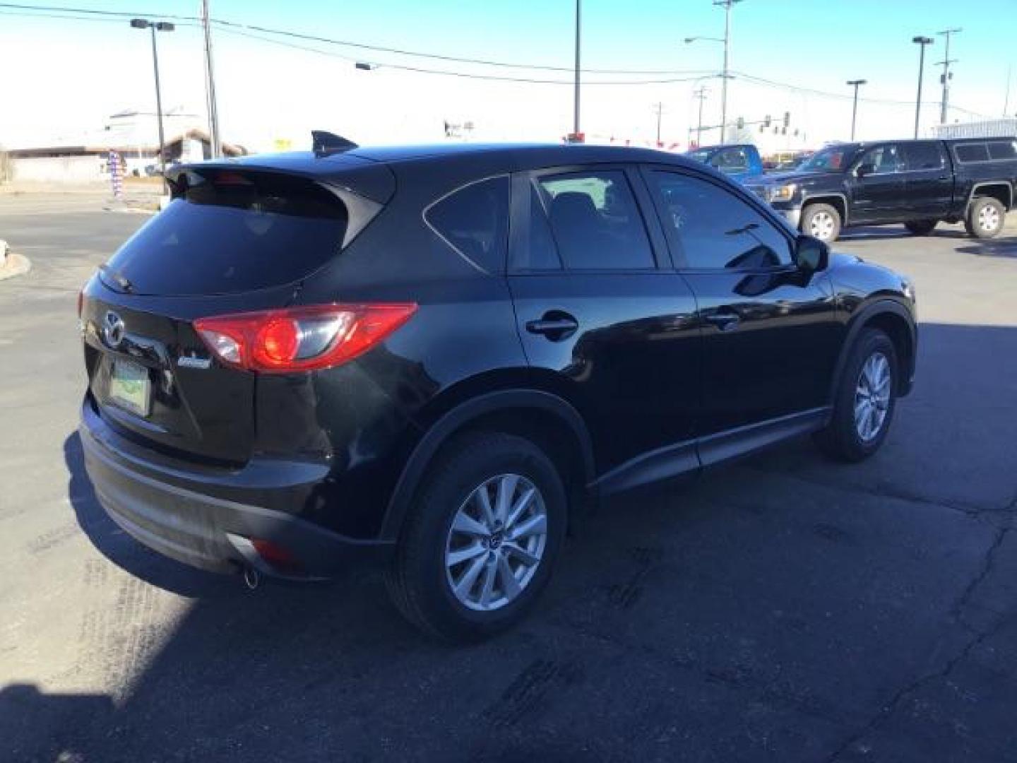 2016 DARK BLUE /Black, premium cloth Mazda CX-5 Touring AWD (JM3KE4CY8G0) with an 2.5L L4 DOHC 16V engine, 6-Speed Automatic transmission, located at 1235 N Woodruff Ave., Idaho Falls, 83401, (208) 523-1053, 43.507172, -112.000488 - This 2016 Mazda CX-5 AWD Touring, has 91,000 miles. Comes with cloth interior, back up camera, blue tooth audio, steering wheel controls, power seats, and power locks and windows. At Timberline Auto it is always easy to find a great deal on your next vehicle! Our experienced sales staff can help fin - Photo#4