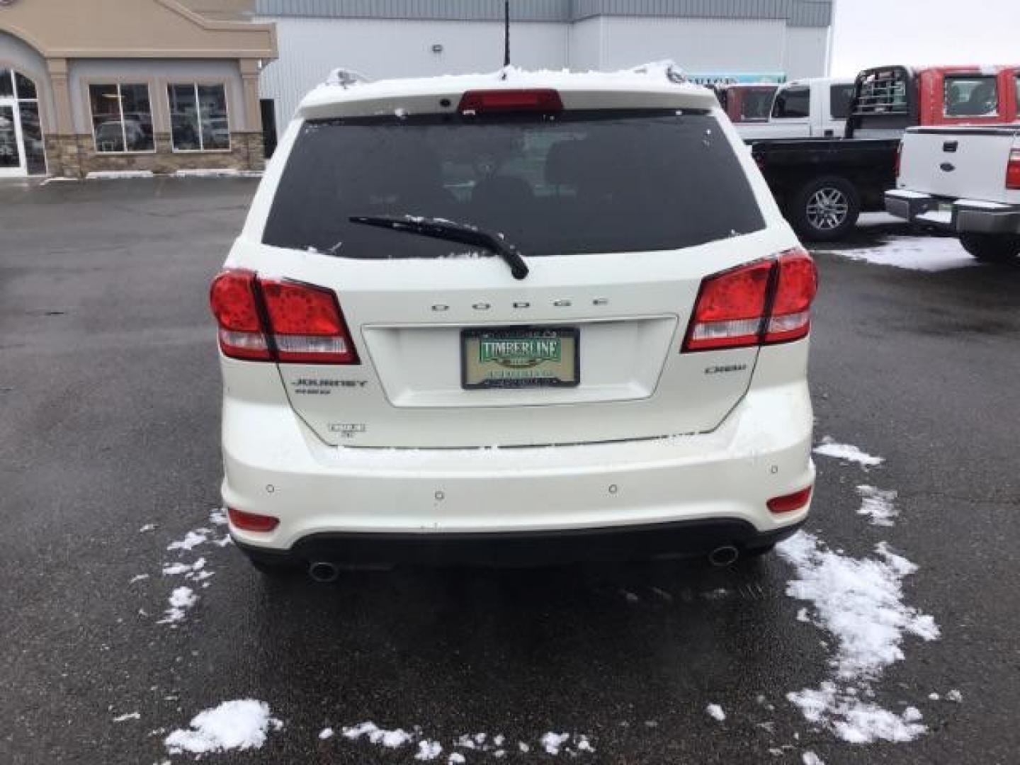 2012 Pearl White Tri-Coat /Black Leather Interior Dodge Journey Crew AWD (3C4PDDDG0CT) with an 3.6L V6 DOHC 24V engine, 6-Speed Automatic transmission, located at 1235 N Woodruff Ave., Idaho Falls, 83401, (208) 523-1053, 43.507172, -112.000488 - This 2012 Dodge Journey AWD, has the 3.5L V6 motor. It has 93,000 miles. It comes with leather interior, blue tooth audio, Touch screen, heated seats, power seats, and cruise control. Also it has 3rd row seating. At Timberline Auto it is always easy to find a great deal on your next vehicle! Our exp - Photo#3