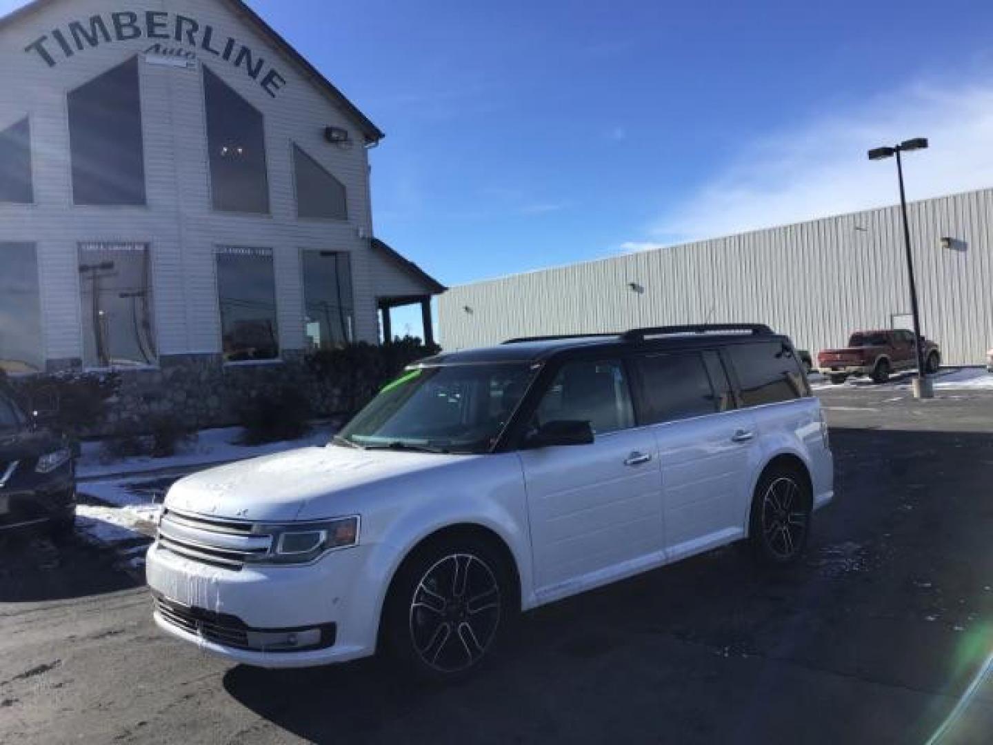 2013 White Platinum Metallic Tricoat /Charcoal Black Leather Interior Ford Flex Limited AWD (2FMHK6DT3DB) with an 3.5L V6 DOHC 24V engine, 6-Speed Automatic Overdrive transmission, located at 1235 N Woodruff Ave., Idaho Falls, 83401, (208) 523-1053, 43.507172, -112.000488 - This 2013 Ford Flex Limited AWD, has 108,000 miles. It comes with leather interior, heated seats, touch screen stereo, blue tooth audio, and a sunroof. At Timberline Auto it is always easy to find a great deal on your next vehicle! Our experienced sales staff can help find the right vehicle will fit - Photo#0