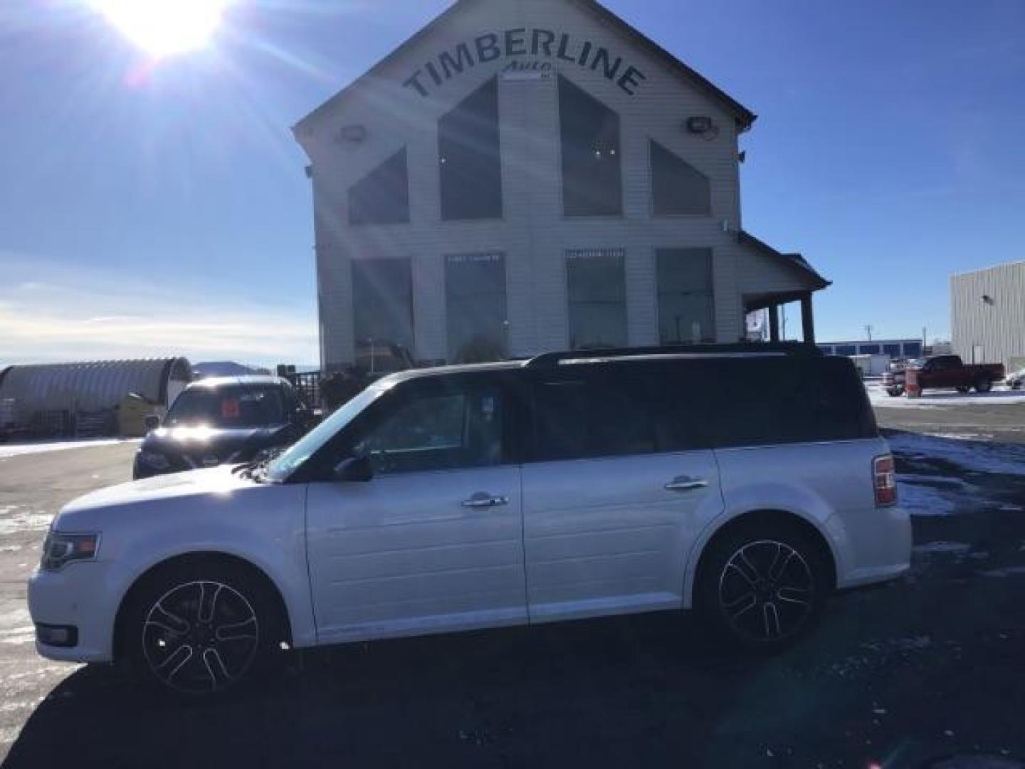 2013 White Platinum Metallic Tricoat /Charcoal Black Leather Interior Ford Flex Limited AWD (2FMHK6DT3DB) with an 3.5L V6 DOHC 24V engine, 6-Speed Automatic Overdrive transmission, located at 1235 N Woodruff Ave., Idaho Falls, 83401, (208) 523-1053, 43.507172, -112.000488 - This 2013 Ford Flex Limited AWD, has 108,000 miles. It comes with leather interior, heated seats, touch screen stereo, blue tooth audio, and a sunroof. At Timberline Auto it is always easy to find a great deal on your next vehicle! Our experienced sales staff can help find the right vehicle will fit - Photo#1