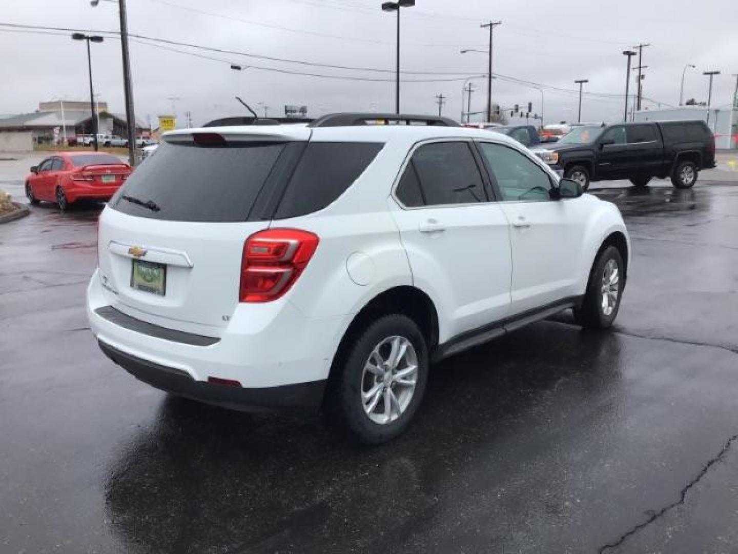 2017 Summit White /Jet Black, premium cloth Chevrolet Equinox LT AWD (2GNFLFEK5H6) with an 2.4L L4 DOHC 16V FFV engine, 6-Speed Automatic transmission, located at 1235 N Woodruff Ave., Idaho Falls, 83401, (208) 523-1053, 43.507172, -112.000488 - This 2017 Chevrolet Equinox LT AWD, has 135,000 miles. Comes with cloth interior, blue tooth audio, power drive seat, back up camera, and cruise control At Timberline Auto it is always easy to find a great deal on your next vehicle! Our experienced sales staff can help find the right vehicle will fi - Photo#4