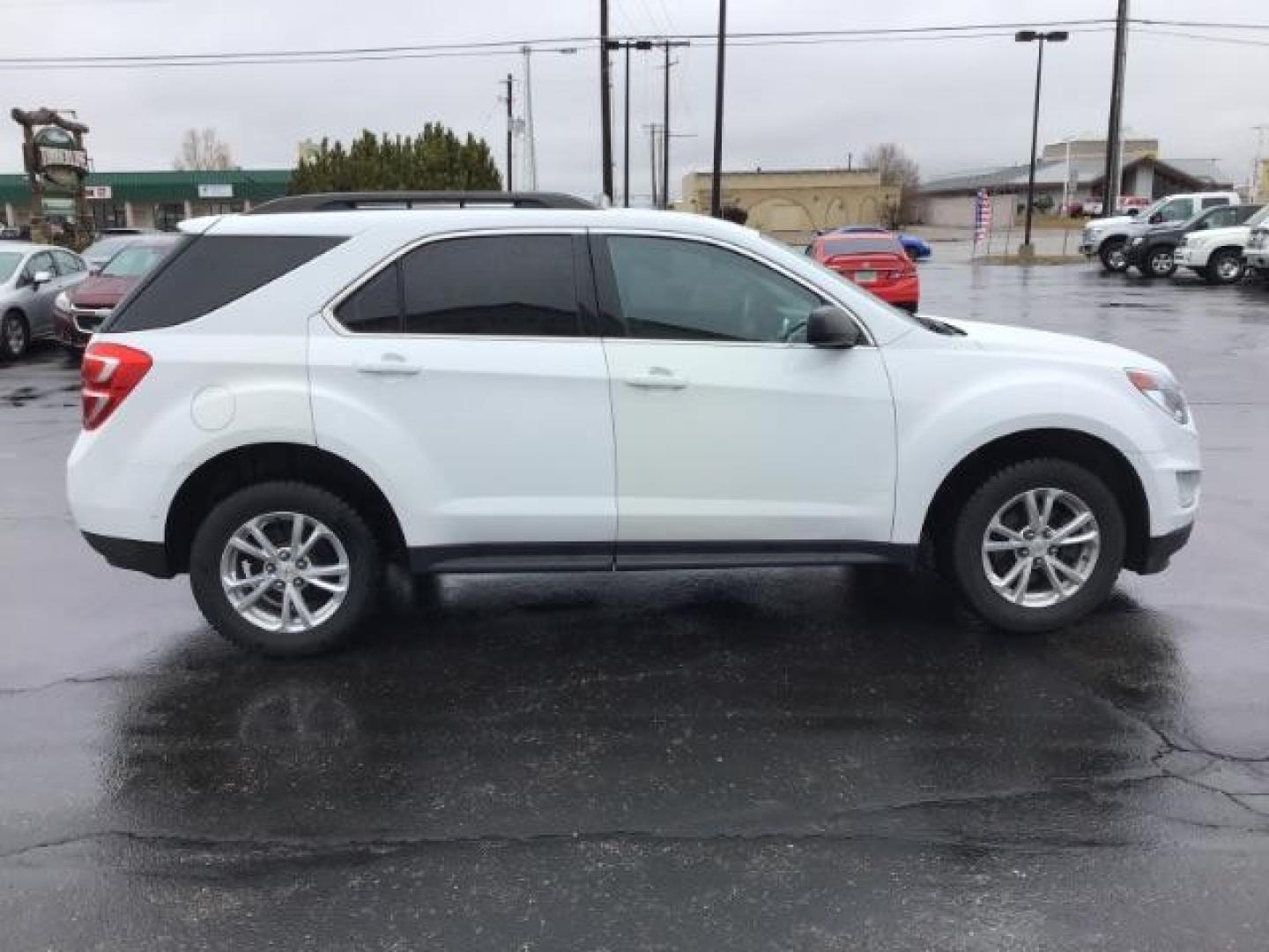 2017 Summit White /Jet Black, premium cloth Chevrolet Equinox LT AWD (2GNFLFEK5H6) with an 2.4L L4 DOHC 16V FFV engine, 6-Speed Automatic transmission, located at 1235 N Woodruff Ave., Idaho Falls, 83401, (208) 523-1053, 43.507172, -112.000488 - This 2017 Chevrolet Equinox LT AWD, has 135,000 miles. Comes with cloth interior, blue tooth audio, power drive seat, back up camera, and cruise control At Timberline Auto it is always easy to find a great deal on your next vehicle! Our experienced sales staff can help find the right vehicle will fi - Photo#5