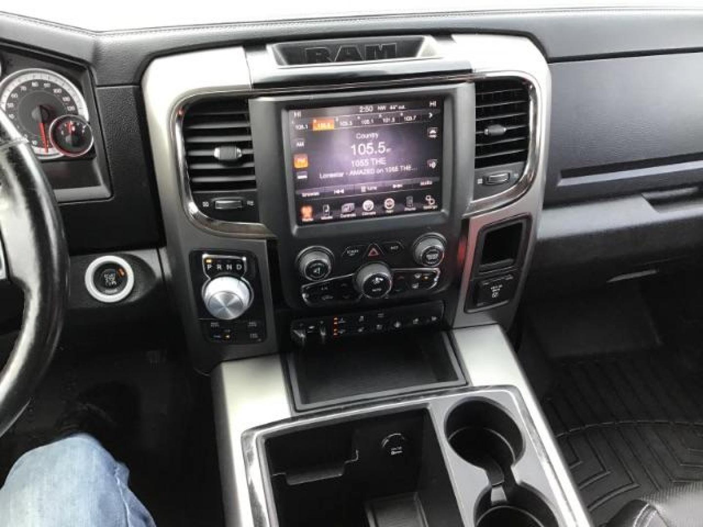 2014 Bright White Clearcoat /Black RAM 1500 Sport Crew Cab LWB 4WD (1C6RR7UT5ES) with an 5.7L V8 OHV 16V engine, 8-Speed Automatic transmission, located at 1235 N Woodruff Ave., Idaho Falls, 83401, (208) 523-1053, 43.507172, -112.000488 - This 2014 Ram 1500 Sport 4x4, has the 5.7L Hemi motor. It has 115,000 miles. Comes with leather interior, heated and cooled seats, power seats, blue tooth audio, back up camera, and power windows and locks. At Timberline Auto it is always easy to find a great deal on your next vehicle! Our experienc - Photo#10