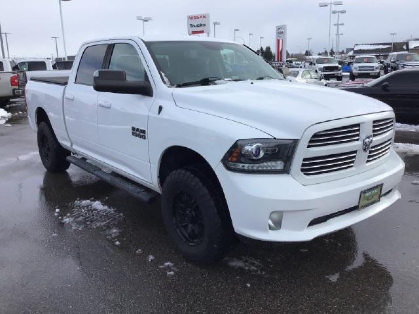 2014 Bright White Clearcoat /Black RAM 1500 Sport Crew Cab LWB 4WD (1C6RR7UT5ES) with an 5.7L V8 OHV 16V engine, 8-Speed Automatic transmission, located at 1235 N Woodruff Ave., Idaho Falls, 83401, (208) 523-1053, 43.507172, -112.000488 - This 2014 Ram 1500 Sport 4x4, has the 5.7L Hemi motor. It has 115,000 miles. Comes with leather interior, heated and cooled seats, power seats, blue tooth audio, back up camera, and power windows and locks. At Timberline Auto it is always easy to find a great deal on your next vehicle! Our experienc - Photo#6