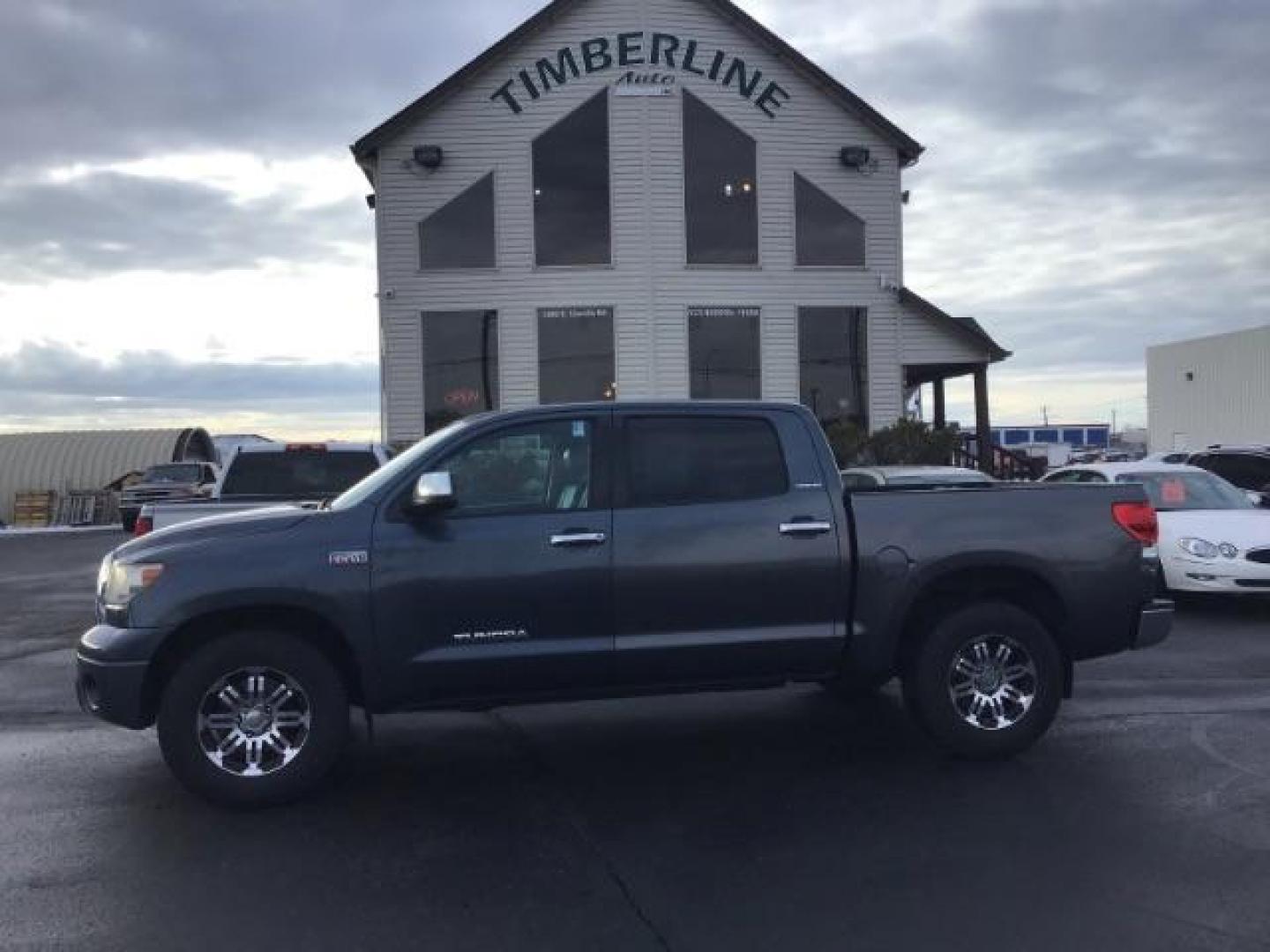 2008 Pyrite Mica /Graphite Leather Interior Toyota Tundra Limited CrewMax 5.7L 4WD (5TBDV58168S) with an 5.7L V8 DOHC 32V engine, 6-Speed Automatic transmission, located at 1235 N Woodruff Ave., Idaho Falls, 83401, (208) 523-1053, 43.507172, -112.000488 - This 2008 Toyota Tundra Limited, has the 5.7L V8 motor. It has 198,000 miles. It comes with leather interior, heated seats, power seats, sunroof, power windows and locks. At Timberline Auto it is always easy to find a great deal on your next vehicle! Our experienced sales staff can help find the ri - Photo#1