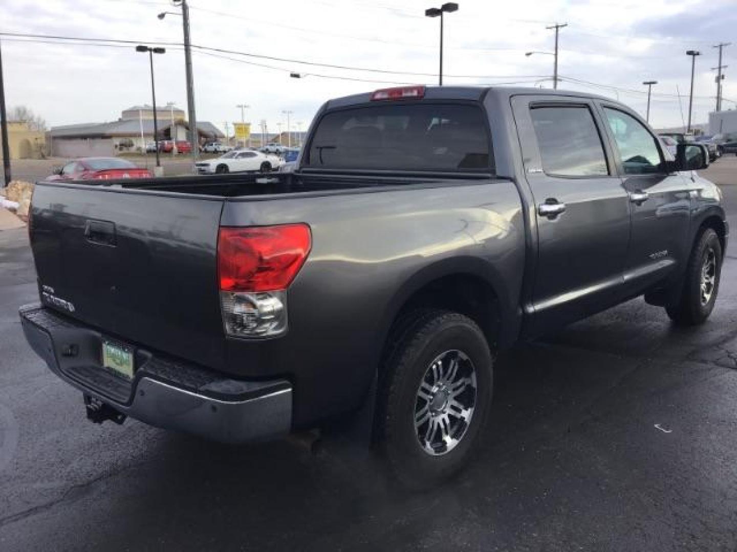 2008 Pyrite Mica /Graphite Leather Interior Toyota Tundra Limited CrewMax 5.7L 4WD (5TBDV58168S) with an 5.7L V8 DOHC 32V engine, 6-Speed Automatic transmission, located at 1235 N Woodruff Ave., Idaho Falls, 83401, (208) 523-1053, 43.507172, -112.000488 - This 2008 Toyota Tundra Limited, has the 5.7L V8 motor. It has 198,000 miles. It comes with leather interior, heated seats, power seats, sunroof, power windows and locks. At Timberline Auto it is always easy to find a great deal on your next vehicle! Our experienced sales staff can help find the ri - Photo#4