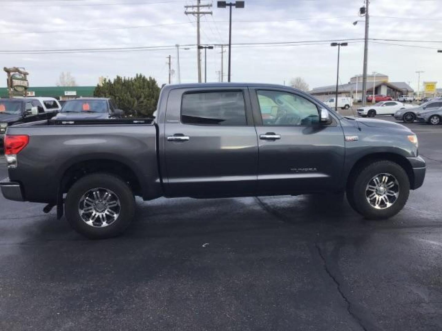 2008 Pyrite Mica /Graphite Leather Interior Toyota Tundra Limited CrewMax 5.7L 4WD (5TBDV58168S) with an 5.7L V8 DOHC 32V engine, 6-Speed Automatic transmission, located at 1235 N Woodruff Ave., Idaho Falls, 83401, (208) 523-1053, 43.507172, -112.000488 - This 2008 Toyota Tundra Limited, has the 5.7L V8 motor. It has 198,000 miles. It comes with leather interior, heated seats, power seats, sunroof, power windows and locks. At Timberline Auto it is always easy to find a great deal on your next vehicle! Our experienced sales staff can help find the ri - Photo#5