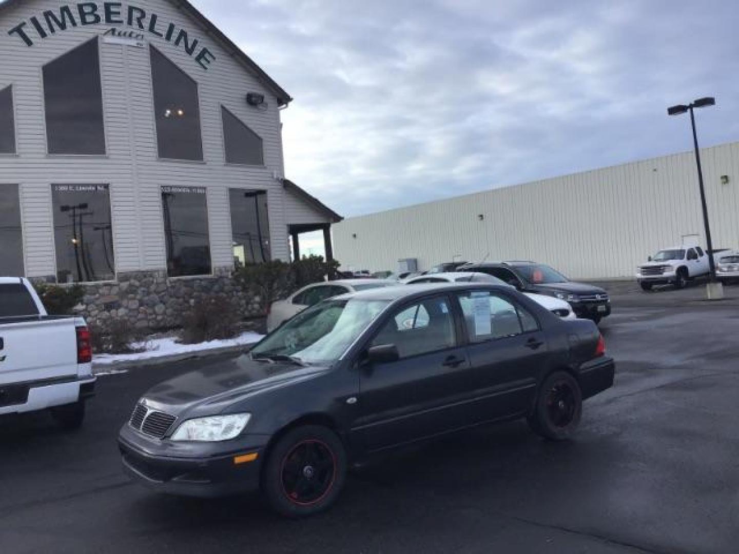 2003 Mitsubishi Lancer ES (JA3AJ26E83U) with an 2.0L L4 SOHC 16V engine, located at 1235 N Woodruff Ave., Idaho Falls, 83401, (208) 523-1053, 43.507172, -112.000488 - This 2003 Mitsubishi Lancer, has a manual transmission. It has 174,000 miles. Really good first time car. At Timberline Auto it is always easy to find a great deal on your next vehicle! Our experienced sales staff can help find the right vehicle will fit your needs. Our knowledgeable finance departm - Photo#0