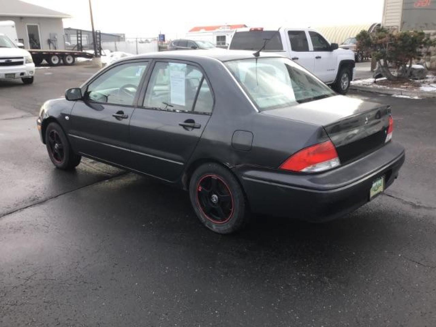 2003 Mitsubishi Lancer ES (JA3AJ26E83U) with an 2.0L L4 SOHC 16V engine, located at 1235 N Woodruff Ave., Idaho Falls, 83401, (208) 523-1053, 43.507172, -112.000488 - This 2003 Mitsubishi Lancer, has a manual transmission. It has 174,000 miles. Really good first time car. At Timberline Auto it is always easy to find a great deal on your next vehicle! Our experienced sales staff can help find the right vehicle will fit your needs. Our knowledgeable finance departm - Photo#2