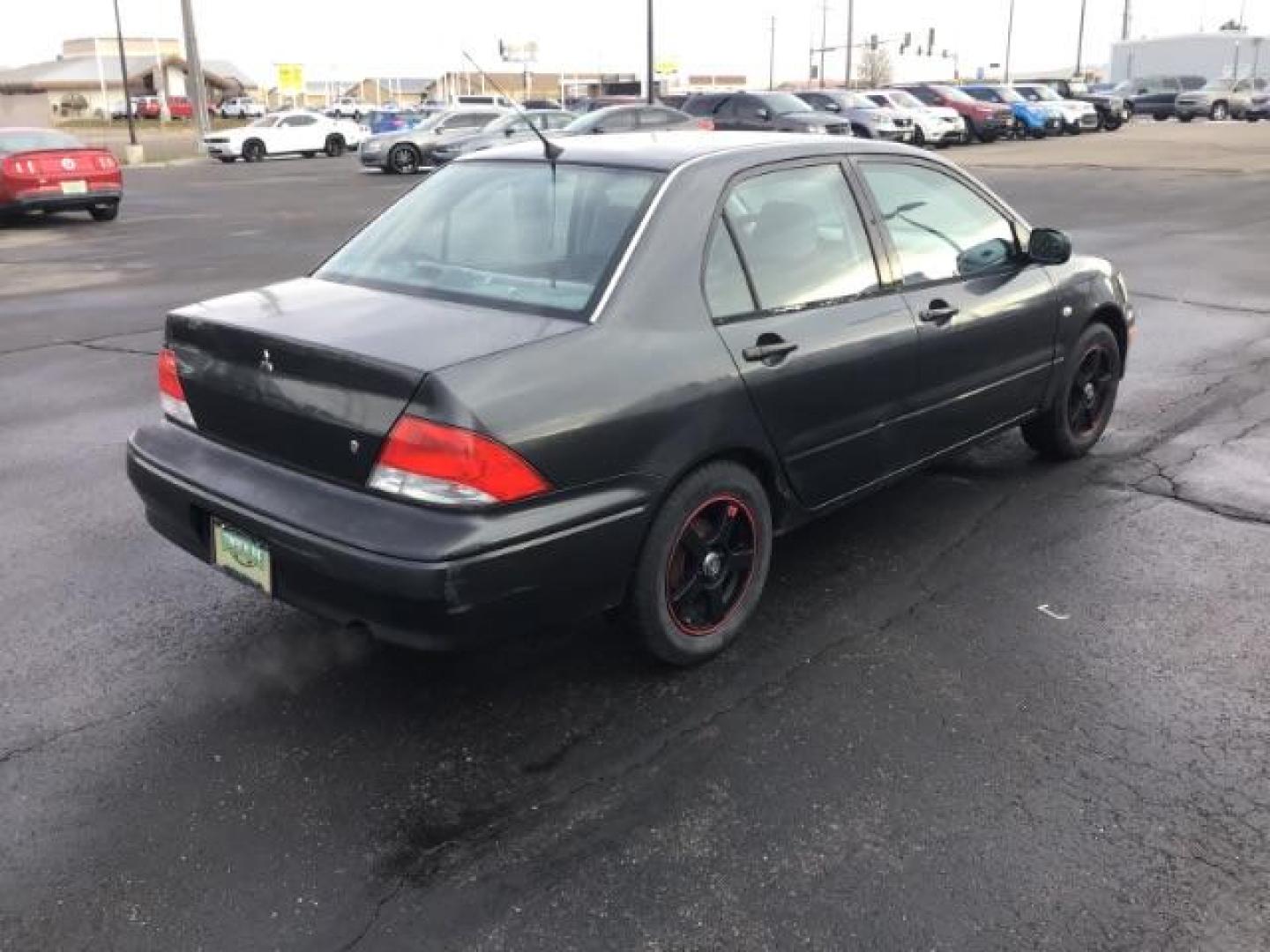 2003 Mitsubishi Lancer ES (JA3AJ26E83U) with an 2.0L L4 SOHC 16V engine, located at 1235 N Woodruff Ave., Idaho Falls, 83401, (208) 523-1053, 43.507172, -112.000488 - This 2003 Mitsubishi Lancer, has a manual transmission. It has 174,000 miles. Really good first time car. At Timberline Auto it is always easy to find a great deal on your next vehicle! Our experienced sales staff can help find the right vehicle will fit your needs. Our knowledgeable finance departm - Photo#4