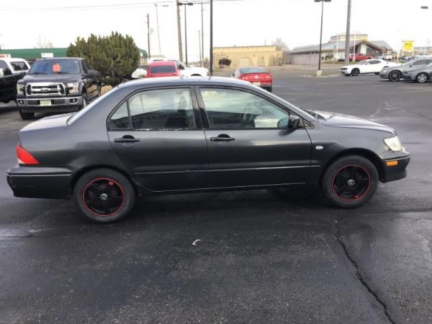 2003 Mitsubishi Lancer ES (JA3AJ26E83U) with an 2.0L L4 SOHC 16V engine, located at 1235 N Woodruff Ave., Idaho Falls, 83401, (208) 523-1053, 43.507172, -112.000488 - This 2003 Mitsubishi Lancer, has a manual transmission. It has 174,000 miles. Really good first time car. At Timberline Auto it is always easy to find a great deal on your next vehicle! Our experienced sales staff can help find the right vehicle will fit your needs. Our knowledgeable finance departm - Photo#5