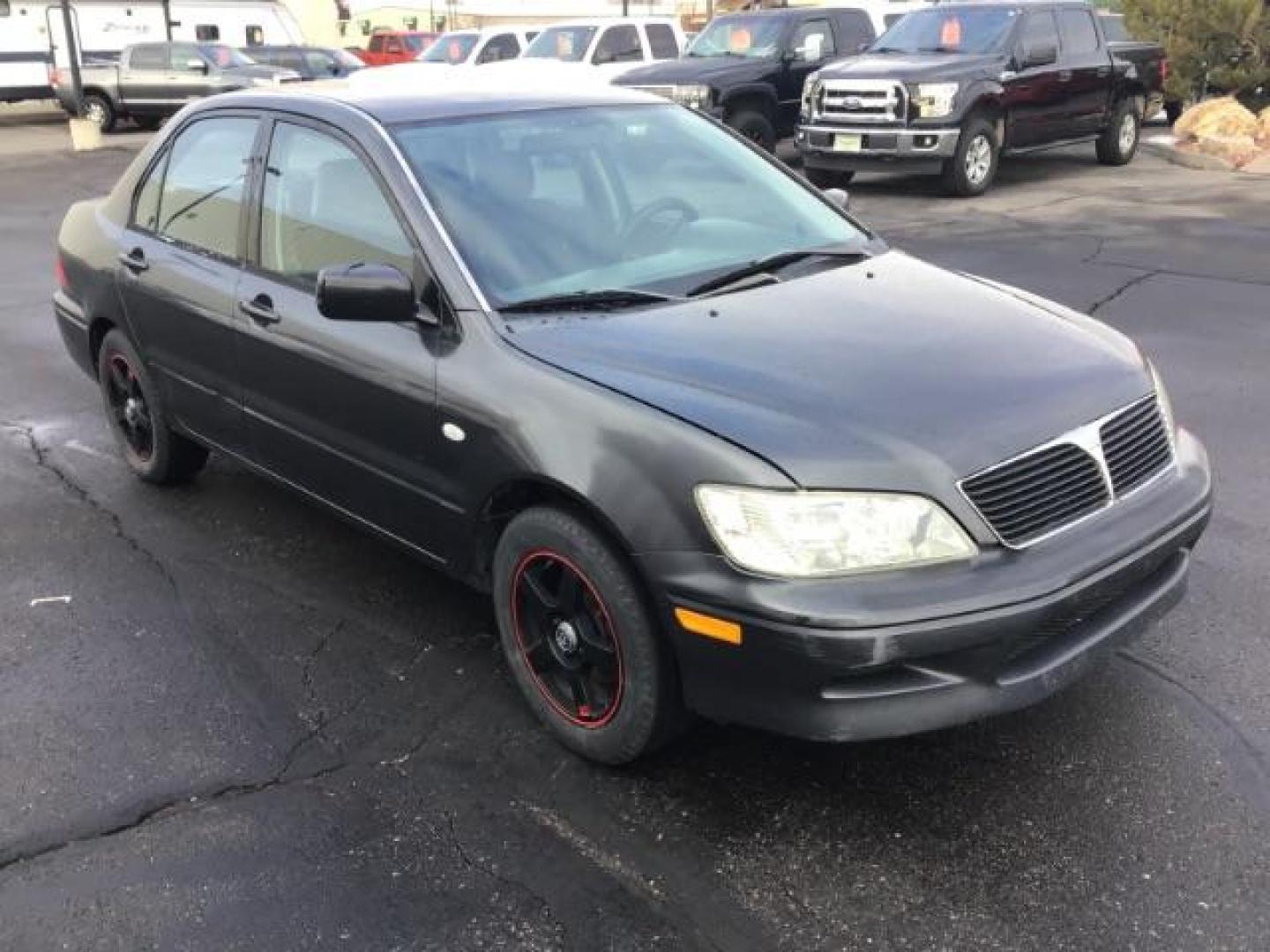 2003 Mitsubishi Lancer ES (JA3AJ26E83U) with an 2.0L L4 SOHC 16V engine, located at 1235 N Woodruff Ave., Idaho Falls, 83401, (208) 523-1053, 43.507172, -112.000488 - This 2003 Mitsubishi Lancer, has a manual transmission. It has 174,000 miles. Really good first time car. At Timberline Auto it is always easy to find a great deal on your next vehicle! Our experienced sales staff can help find the right vehicle will fit your needs. Our knowledgeable finance departm - Photo#6