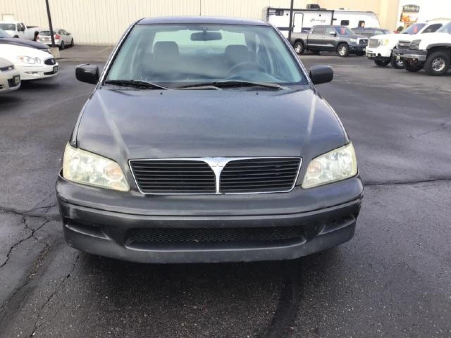 2003 Mitsubishi Lancer ES (JA3AJ26E83U) with an 2.0L L4 SOHC 16V engine, located at 1235 N Woodruff Ave., Idaho Falls, 83401, (208) 523-1053, 43.507172, -112.000488 - This 2003 Mitsubishi Lancer, has a manual transmission. It has 174,000 miles. Really good first time car. At Timberline Auto it is always easy to find a great deal on your next vehicle! Our experienced sales staff can help find the right vehicle will fit your needs. Our knowledgeable finance departm - Photo#7