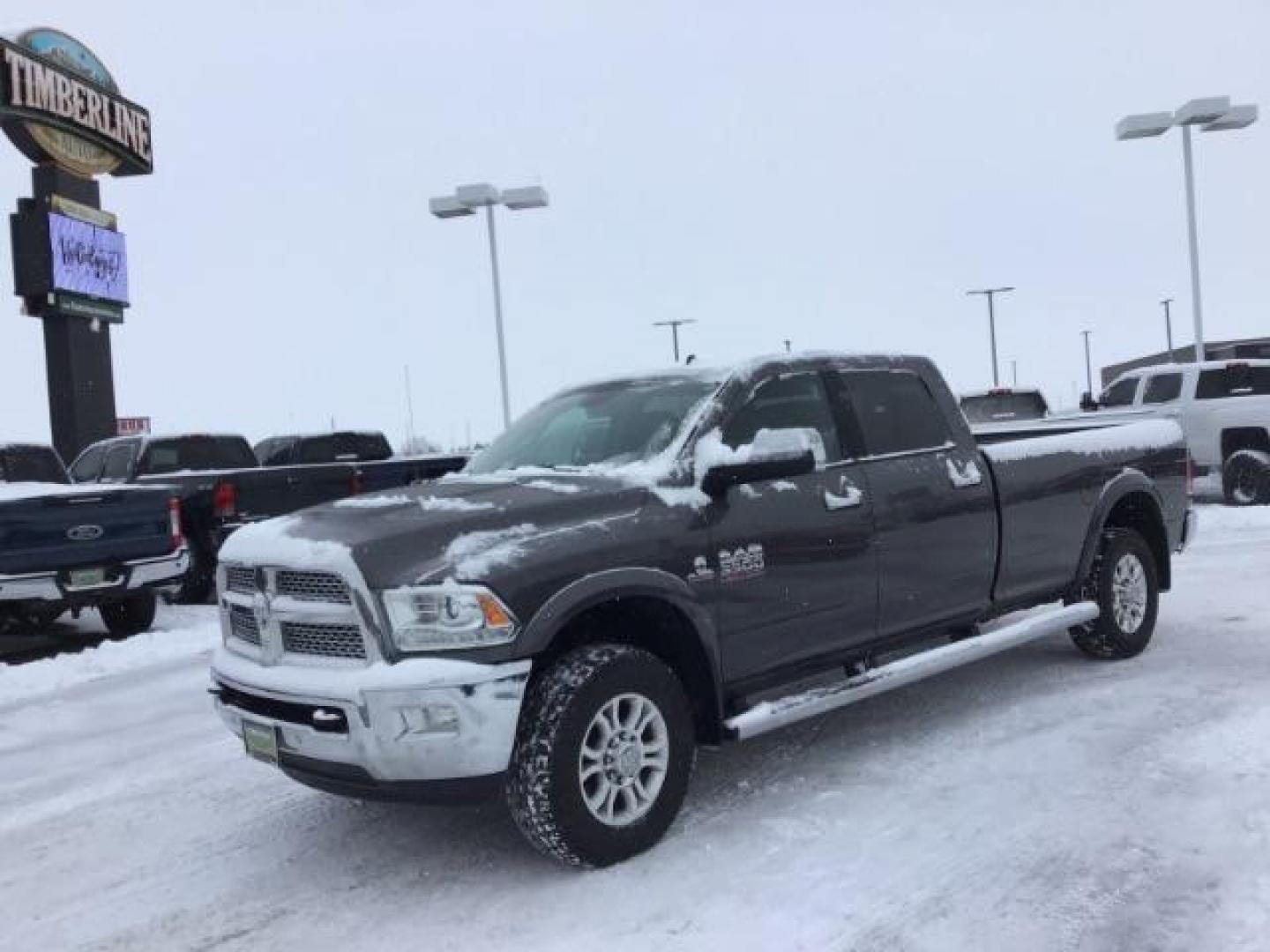 2016 Granite Crystal Metallic Clear Coat /Black, leather RAM 3500 Laramie Crew Cab LWB 4WD (3C63R3JL3GG) with an 6.7L L6 OHV 24V TURBO DIESEL engine, 6-Speed Automatic transmission, located at 1235 N Woodruff Ave., Idaho Falls, 83401, (208) 523-1053, 43.507172, -112.000488 - This 2016 Ram 3500 Laramie 4x4, has the 6.7L diesel motor. It has 163,000 miles. Comes with leather interior, keyless remote, back up camera, heated and cooled seats, and blue tooth audio. At Timberline Auto it is always easy to find a great deal on your next vehicle! Our experienced sales staff can - Photo#0