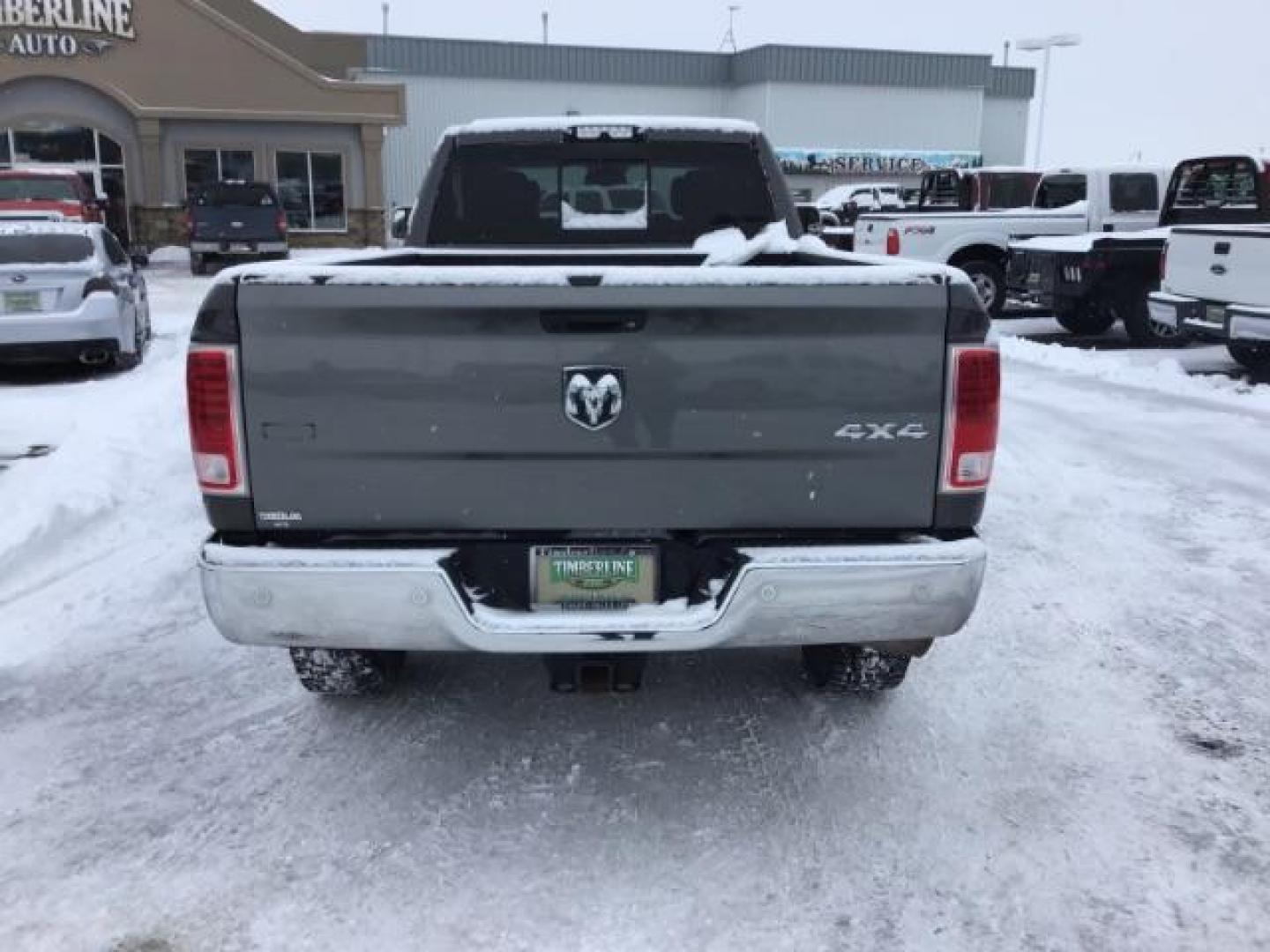 2016 Granite Crystal Metallic Clear Coat /Black, leather RAM 3500 Laramie Crew Cab LWB 4WD (3C63R3JL3GG) with an 6.7L L6 OHV 24V TURBO DIESEL engine, 6-Speed Automatic transmission, located at 1235 N Woodruff Ave., Idaho Falls, 83401, (208) 523-1053, 43.507172, -112.000488 - This 2016 Ram 3500 Laramie 4x4, has the 6.7L diesel motor. It has 163,000 miles. Comes with leather interior, keyless remote, back up camera, heated and cooled seats, and blue tooth audio. At Timberline Auto it is always easy to find a great deal on your next vehicle! Our experienced sales staff can - Photo#3