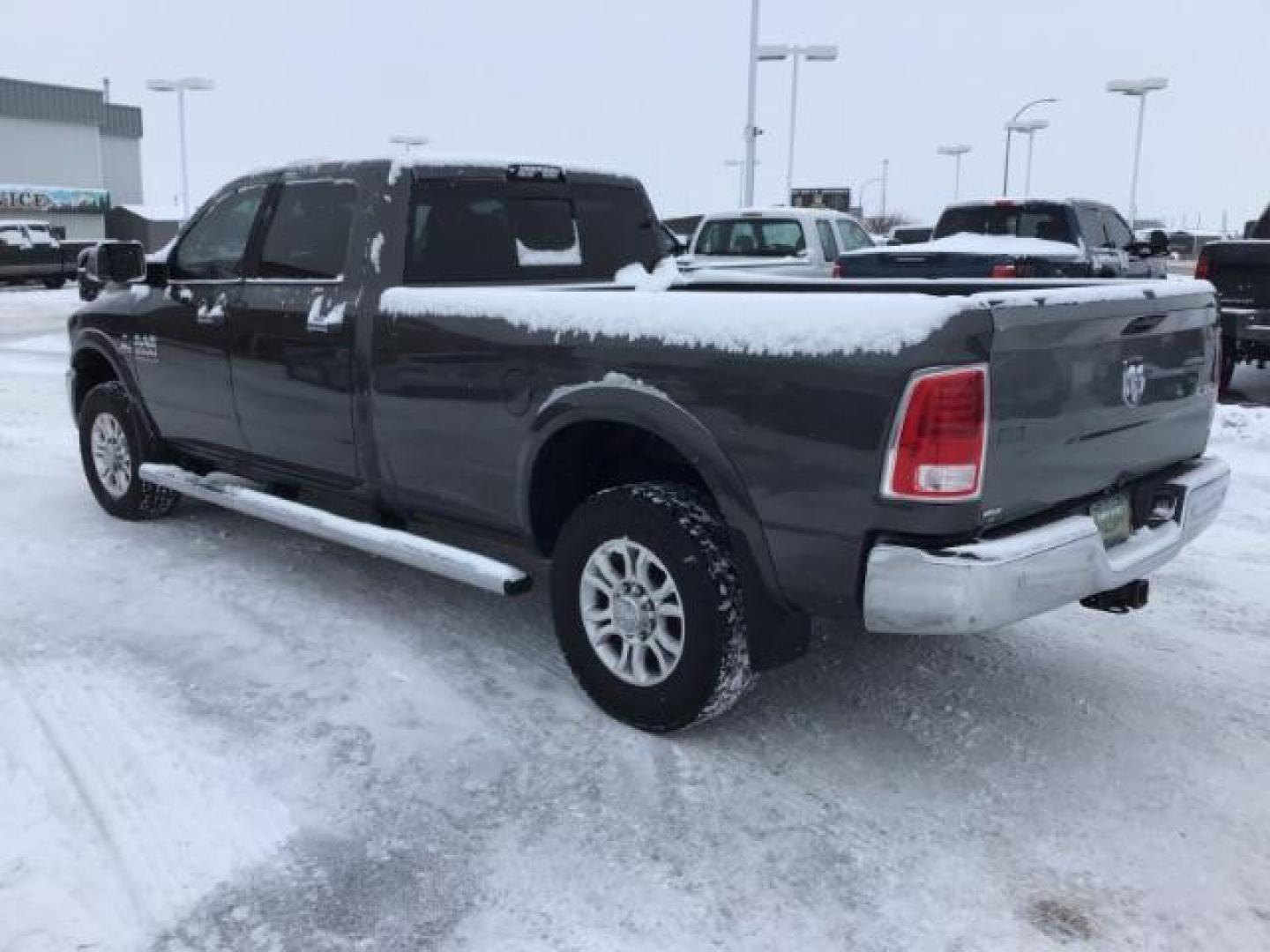 2016 Granite Crystal Metallic Clear Coat /Black, leather RAM 3500 Laramie Crew Cab LWB 4WD (3C63R3JL3GG) with an 6.7L L6 OHV 24V TURBO DIESEL engine, 6-Speed Automatic transmission, located at 1235 N Woodruff Ave., Idaho Falls, 83401, (208) 523-1053, 43.507172, -112.000488 - This 2016 Ram 3500 Laramie 4x4, has the 6.7L diesel motor. It has 163,000 miles. Comes with leather interior, keyless remote, back up camera, heated and cooled seats, and blue tooth audio. At Timberline Auto it is always easy to find a great deal on your next vehicle! Our experienced sales staff can - Photo#4