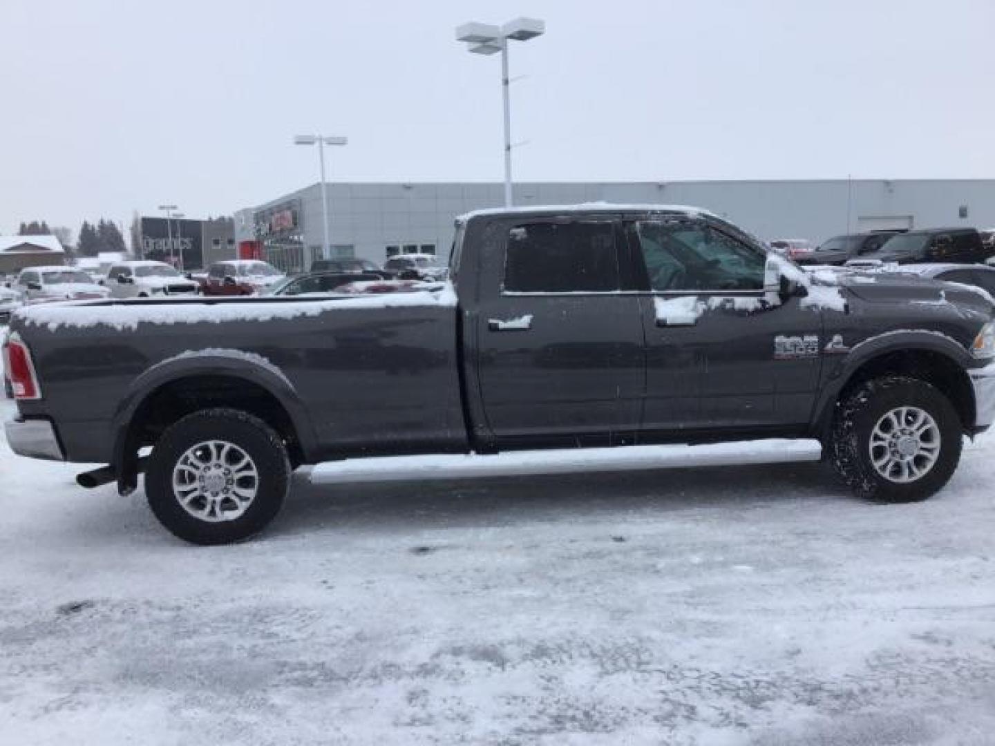 2016 Granite Crystal Metallic Clear Coat /Black, leather RAM 3500 Laramie Crew Cab LWB 4WD (3C63R3JL3GG) with an 6.7L L6 OHV 24V TURBO DIESEL engine, 6-Speed Automatic transmission, located at 1235 N Woodruff Ave., Idaho Falls, 83401, (208) 523-1053, 43.507172, -112.000488 - This 2016 Ram 3500 Laramie 4x4, has the 6.7L diesel motor. It has 163,000 miles. Comes with leather interior, keyless remote, back up camera, heated and cooled seats, and blue tooth audio. At Timberline Auto it is always easy to find a great deal on your next vehicle! Our experienced sales staff can - Photo#5