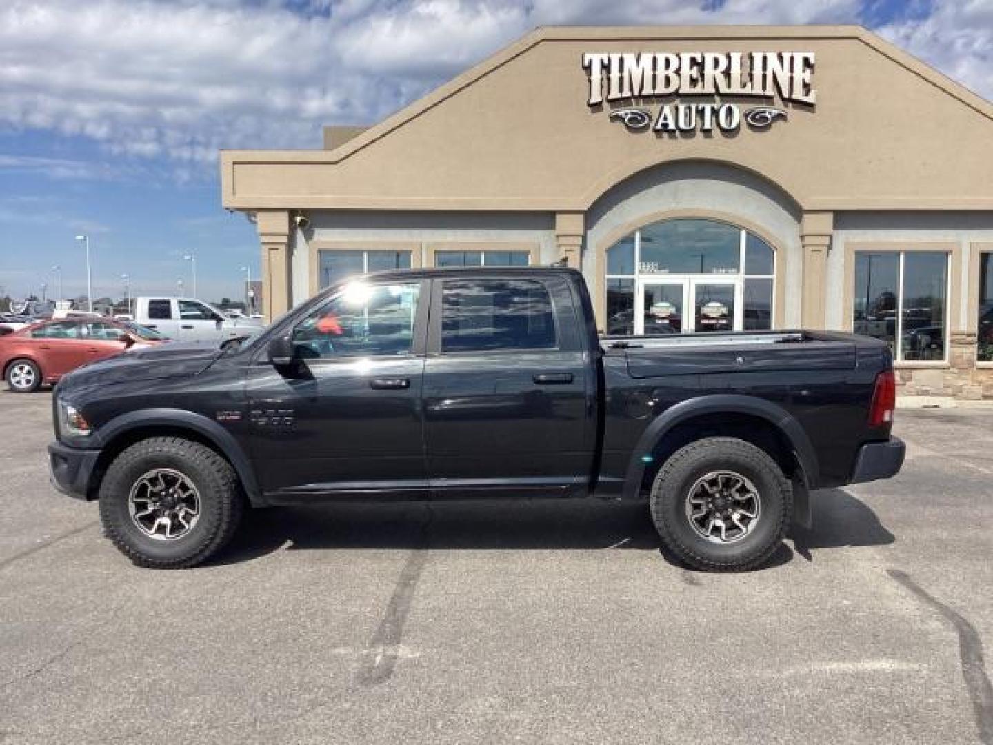 2017 Granite Crystal Metallic Clear Coat/Brilliant Blac /Black, premium cloth RAM 1500 Rebel Crew Cab SWB 4WD (1C6RR7YT5HS) with an 5.7L V8 OHV 16V engine, 8-Speed Automatic transmission, located at 1235 N Woodruff Ave., Idaho Falls, 83401, (208) 523-1053, 43.507172, -112.000488 - Photo#1