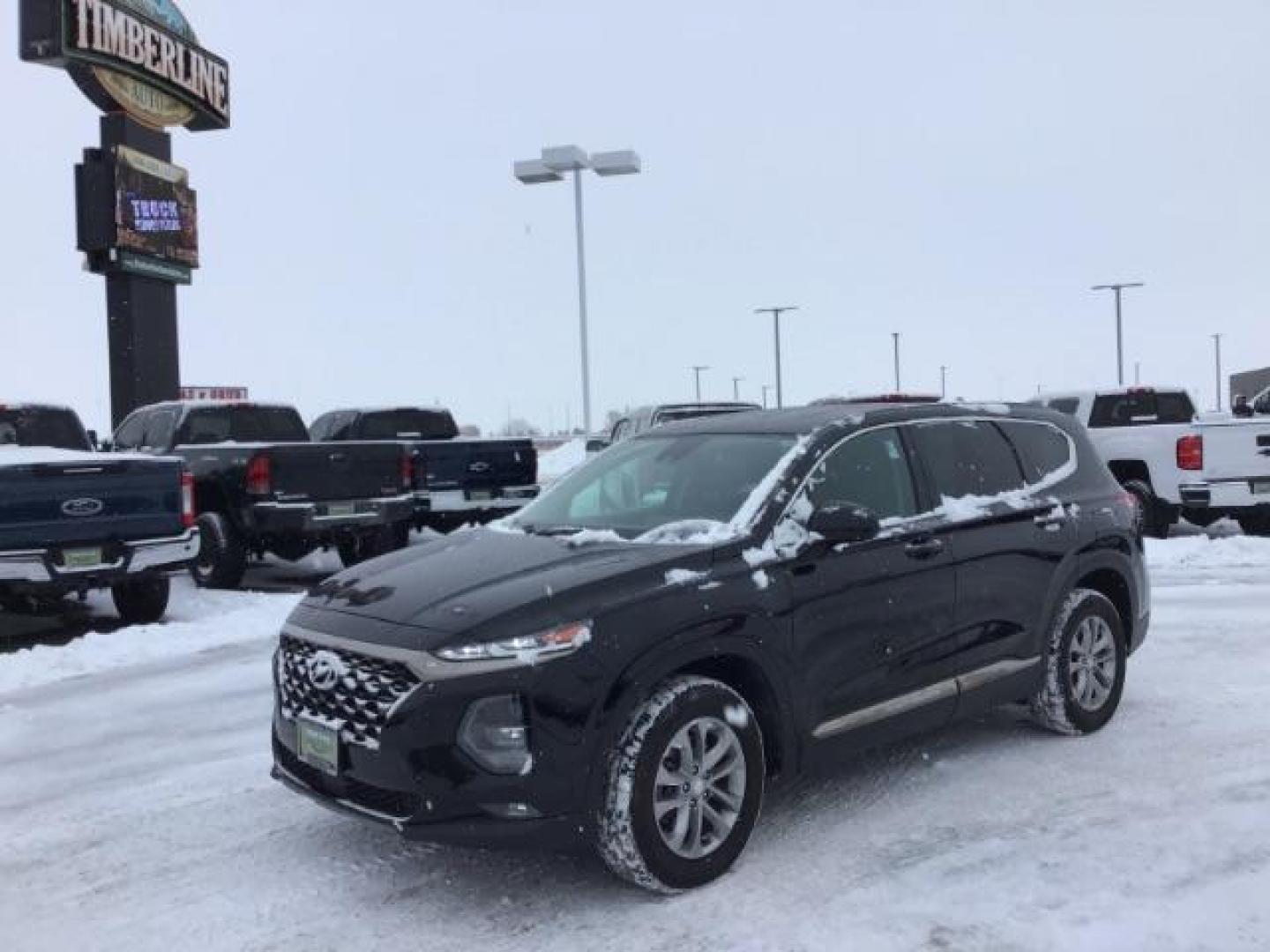 2019 Twilight Black /Black/Black, cloth Hyundai Santa Fe SEL 2.4 AWD (5NMS3CAD8KH) with an 2.4L L4 DOHC 16V engine, 8-Speed Automatic transmission, located at 1235 N Woodruff Ave., Idaho Falls, 83401, (208) 523-1053, 43.507172, -112.000488 - This 2019 Hyundai Santa Fe, has 65,000 miles. Comes with cloth seats, heated seats, blue tooth audio, and power windows and locks At Timberline Auto it is always easy to find a great deal on your next vehicle! Our experienced sales staff can help find the right vehicle that will fit your needs. Our - Photo#0