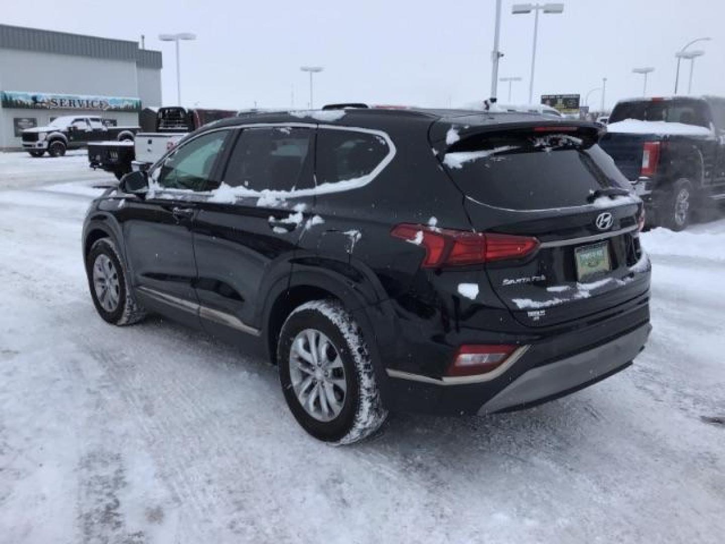 2019 Twilight Black /Black/Black, cloth Hyundai Santa Fe SEL 2.4 AWD (5NMS3CAD8KH) with an 2.4L L4 DOHC 16V engine, 8-Speed Automatic transmission, located at 1235 N Woodruff Ave., Idaho Falls, 83401, (208) 523-1053, 43.507172, -112.000488 - This 2019 Hyundai Santa Fe, has 65,000 miles. Comes with cloth seats, heated seats, blue tooth audio, and power windows and locks At Timberline Auto it is always easy to find a great deal on your next vehicle! Our experienced sales staff can help find the right vehicle that will fit your needs. Our - Photo#2