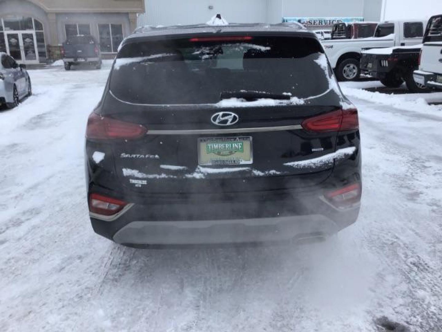 2019 Twilight Black /Black/Black, cloth Hyundai Santa Fe SEL 2.4 AWD (5NMS3CAD8KH) with an 2.4L L4 DOHC 16V engine, 8-Speed Automatic transmission, located at 1235 N Woodruff Ave., Idaho Falls, 83401, (208) 523-1053, 43.507172, -112.000488 - This 2019 Hyundai Santa Fe, has 65,000 miles. Comes with cloth seats, heated seats, blue tooth audio, and power windows and locks At Timberline Auto it is always easy to find a great deal on your next vehicle! Our experienced sales staff can help find the right vehicle that will fit your needs. Our - Photo#3