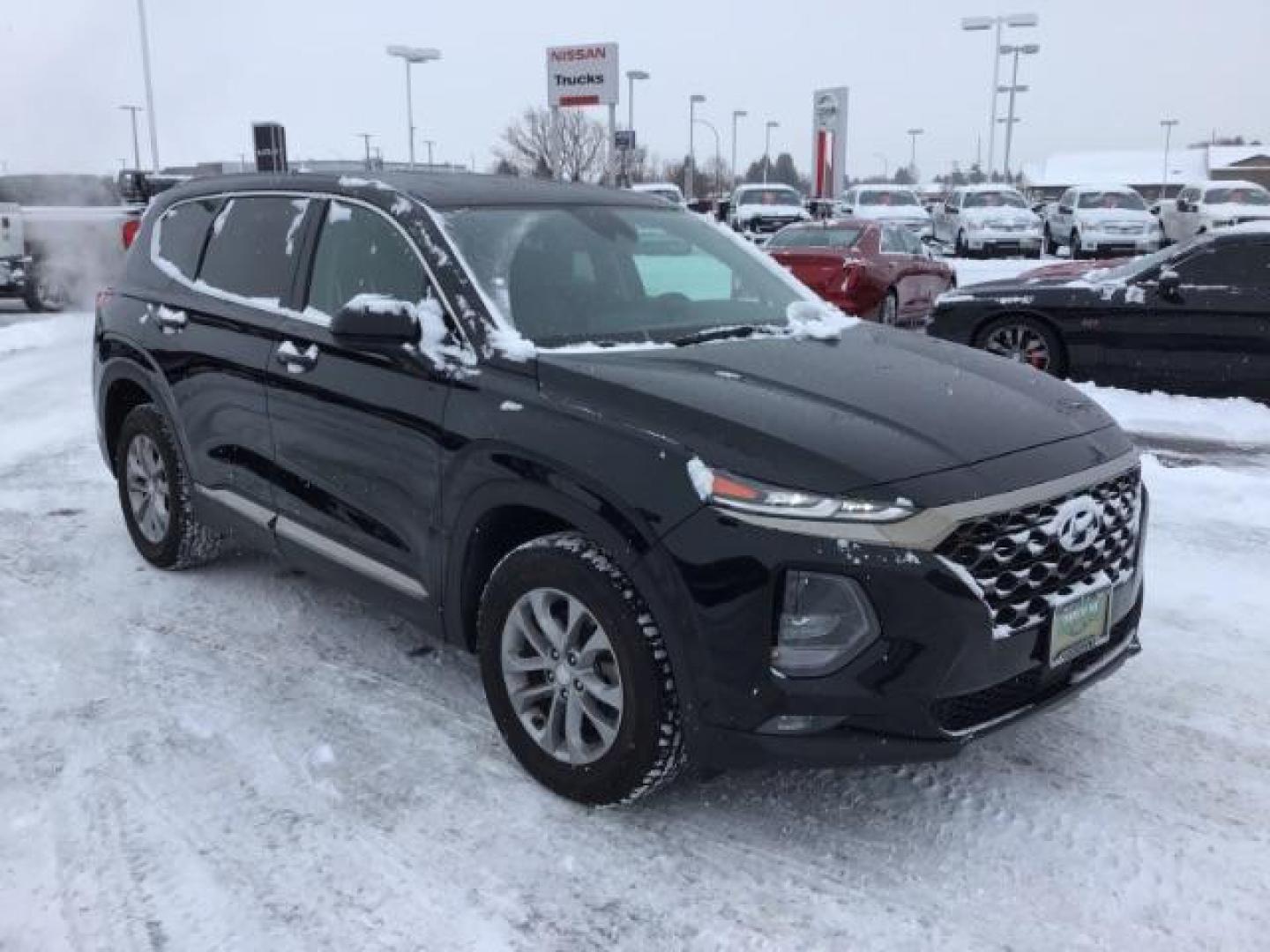 2019 Twilight Black /Black/Black, cloth Hyundai Santa Fe SEL 2.4 AWD (5NMS3CAD8KH) with an 2.4L L4 DOHC 16V engine, 8-Speed Automatic transmission, located at 1235 N Woodruff Ave., Idaho Falls, 83401, (208) 523-1053, 43.507172, -112.000488 - This 2019 Hyundai Santa Fe, has 65,000 miles. Comes with cloth seats, heated seats, blue tooth audio, and power windows and locks At Timberline Auto it is always easy to find a great deal on your next vehicle! Our experienced sales staff can help find the right vehicle that will fit your needs. Our - Photo#6